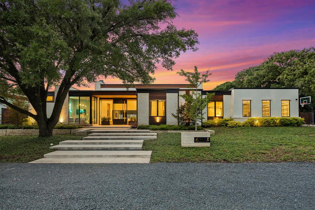 Experience refined luxury in this exceptional modern estate, completed in 2022 and ideally situated in the coveted Bettinger Place community of Colleyville. Built by Heritage Homes, this single-story residence spans over 5400 sf, offering a seamless blend of sophistication, comfort, and indoor-outdoor living.

Set on .674 acres, the home features 5 spacious bedrooms, 5 full baths, and 1 half bath, along with a private office, media room, fitness room, mudroom, an oversized laundry room with dog wash station, and a detached guest house.

Designed with meticulous attention to detail, the home showcases white oak hardwood flooring, custom cabinetry with accent lighting, spray foam insulation, four HVAC systems, motorized shades, integrated speakers, surveillance cameras, 12 mounted TVs, and a Control4 smart home system—all conveying.

A glass-enclosed office opens to the expansive living area, highlighted by soaring ceilings and abundant natural light. The chef’s kitchen is equipped with Thermador appliances, including three ovens, two dishwashers, dual refrigerator & freezer columns, ice maker, warming drawer, and a large walk-in pantry.

Sliding glass doors extend the living space to a climate-controlled outdoor area featuring motorized shades, fireplace, and a fully equipped kitchen with grill, smoker, ice maker, sink, and bar seating. The resort-style pool and spa offer heating and chilling, plus a swim jet and self-cleaning system.

The private primary suite offers a spa-inspired bath with soaking tub, dual-head shower, coffee bar, and beverage refrigerator. Additional highlights include three fireplaces, a gated courtyard, EV-ready garages, Generac generator, and irrigation water storage.

A 3-car attached garage plus a two-car detached garage (with a 14-ft door) offers flexibility for car collectors, RV storage, or workshop use. 

This property delivers an exceptional blend of luxury, technology, and design!