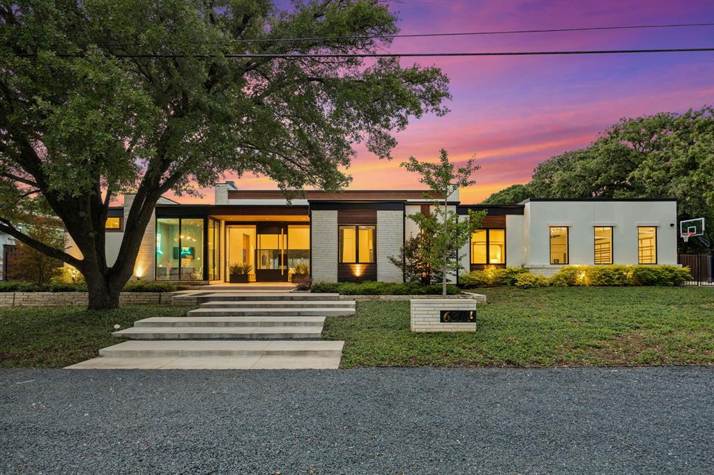 Experience refined luxury in this exceptional modern estate, completed in 2022 and ideally situated in the coveted Bettinger Place community of Colleyville. Built by Heritage Homes, this single-story residence spans over 5400 sf, offering a seamless blend of sophistication, comfort, and indoor-outdoor living.

Set on .674 acres, the home features 5 spacious bedrooms, 5 full baths, and 1 half bath, along with a private office, media room, fitness room, mudroom, an oversized laundry room with dog wash station, and a detached guest house.

Designed with meticulous attention to detail, the home showcases white oak hardwood flooring, custom cabinetry with accent lighting, spray foam insulation, four HVAC systems, motorized shades, integrated speakers, surveillance cameras, 12 mounted TVs, and a Control4 smart home system—all conveying.

A glass-enclosed office opens to the expansive living area, highlighted by soaring ceilings and abundant natural light. The chef’s kitchen is equipped with Thermador appliances, including three ovens, two dishwashers, dual refrigerator & freezer columns, ice maker, warming drawer, and a large walk-in pantry.

Sliding glass doors extend the living space to a climate-controlled outdoor area featuring motorized shades, fireplace, and a fully equipped kitchen with grill, smoker, ice maker, sink, and bar seating. The resort-style pool and spa offer heating and chilling, plus a swim jet and self-cleaning system.

The private primary suite offers a spa-inspired bath with soaking tub, dual-head shower, coffee bar, and beverage refrigerator. Additional highlights include three fireplaces, a gated courtyard, EV-ready garages, Generac generator, and irrigation water storage.

A 3-car attached garage plus a two-car detached garage (with a 14-ft door) offers flexibility for car collectors, RV storage, or workshop use. 

This property delivers an exceptional blend of luxury, technology, and design!