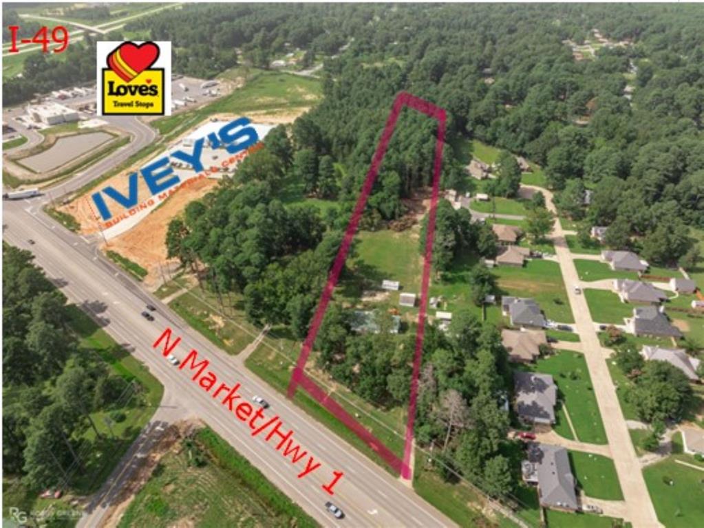 Great opportunity here right in line with other commercial sales on North Market.  3+ Acres here and you have 192' of frontage on North Market. This parcel is already annexed into Blanchard so you don't have to deal with the pesky MPC & governing bodies in Shreveport. There is an existing home on the property that can be used commercially. See AGENT REMARKS. You also have 7 acres currently listed just next door mls 20286780. Next to that is the brand new Ivey's Lumber & Ace Hardware and next to that is Love's Travel. We are growing growing in North Shreveport.  Come grow with us.