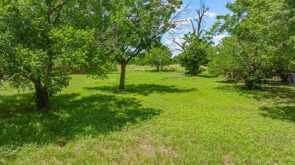 EXTREMELY RARE OPPORTUNITY to own almost 6 acres in Downtown Granbury! Package includes 3 parcels, all contiguous. 912 has 80 feet of road frontage on W. Bridge. The other lots are accessed via 912, so package won't be split up to avoid locked land. Perfect for large house or complex of homes. All city utilities. Adjacent to City Parks, schools. 912 has total 5.687 acres along with 908 2 parcels. Street ends in cul de sac, so there should only be destination traffic, allowing for maximum privacy, but in the heart of Downtown Granbury! As central a location as you can get! SURVEY AVAILABLE. Full Legal is:Property ID: R000098725 , R000096689 and R000037049