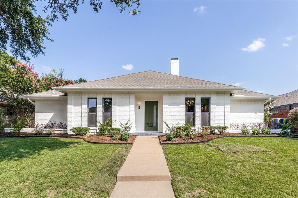 Guided by the home's original design and architecture, the total renovation of 7122 Winedale balances thoughtful preservation with carefully curated updates. The home was completely renovated for contemporary taste and function with original elements retained when possible to add character and identity. 
With 3 bedrooms, 2.5 baths, and 2 living areas, the floor plan balances open living with thoughtfully defined spaces. Original stone terrazzo, grasscloth ceiling, and an architectural planter define the entryway that opens to the spacious central living room with vaulted ceilings, exposed wood beam, blonde brick fireplace, and oversized planter that remain as defining architectural features. Newly replaced paneling maintains the style of the original living area but in a higher grade material.
The functional kitchen features green cabinetry, custom fluted oak vent hood and oak shelves, natural honed Taj Mahal quartzite countertops, a built-in banquette with storage, and a peninsula for additional seating and serving. Wet bar between the living areas adds charm with original cabinetry and showcases a relocated section of the original kitchen wallpaper. Mud area, wallpapered powder room and second living area beyond add functionality as well as style.
Private primary suite includes dual closets,a spacious bath with custom double vanity, blue quartzite countertops,freestanding tub,marble and zellige shower, and full wall of original cabinetry that adds storage and interest. Two secondary bedrooms share an updated bath with patterned cement tile, teak vanity, quartzite countertops, and polished brass fixtures. Full laundry with sink, blue quartzite, Saltillo tile and extra pantry. Throughout the home, artisan tile, nail-down hardwood floors, carefully selected new and repurposed original light fixtures,new windows, thoughtful paint selections, and quality materials result in a warm and inviting home ready for new owners to enjoy.