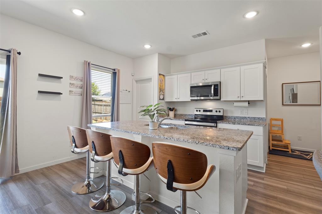 **$5000 SELLER CREDIT WITH ACCEPTABLE OFFER** Welcome home to this beautifully maintained 2-story home located in sought-after Northwest ISD! Featuring 4 bedrooms and 2.5 bathrooms, this move-in ready home offers an open-concept layout perfect for everyday living and entertaining. The bright and airy living, dining, and kitchen spaces are filled with natural light, creating a warm and inviting atmosphere throughout. The spacious kitchen flows seamlessly into the main living area, making it ideal for gathering with family and friends. Step outside to enjoy the large, private backyard complete with added concrete patio space, perfect for outdoor dining, relaxing, or hosting summer get-togethers. Additional updates include a new dishwasher, adding to the home’s convenience and functionality. With plenty of space inside and out, this home combines comfort, style, and practicality in a fantastic location.