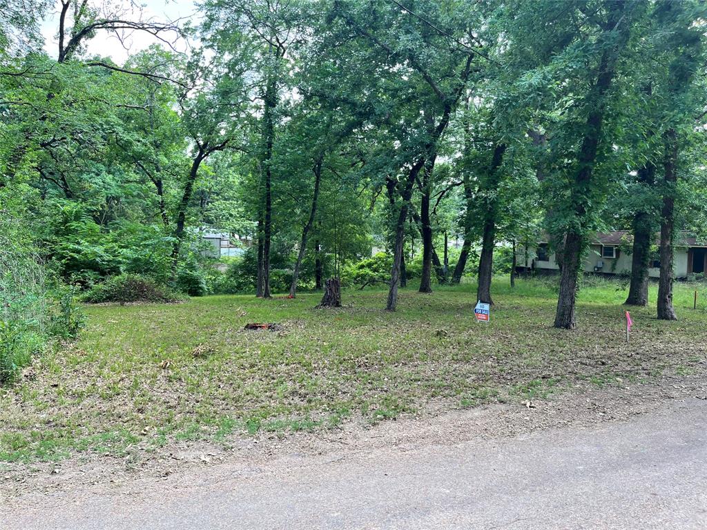 This build-ready lot in the waterfront community of Indian Harbor at Cedar Creek Lake presents a wonderful opportunity to create the home you have always envisioned. Recently cleared and surrounded by mature trees, the property offers approximately sixty-nine feet of road frontage with a depth of around one hundred feet, providing plenty of room to design a layout that works for your needs.

One of the standout advantages here is the infrastructure already in place. City water, sewer, and electricity are available for connection right at the road frontage, streamlining the building process considerably. The seller also has a current survey ready, eliminating one more hurdle before construction can begin. Those interested in manufactured homes will be pleased to know this lot accommodates that option as well.

The surrounding area adds genuine appeal to this property. A neighborhood park and boat ramps are within easy walking distance, making it simple to enjoy the lake whenever the mood strikes. Enchanted Oaks Park is close by for even more outdoor recreation. Grocery shopping and schools within the well-regarded Eustace Independent School District are only a short drive away, keeping everyday conveniences within reach.

Whether you are searching for the perfect spot to build a full-time lakeside home or a relaxing weekend getaway, this lot deserves a closer look. Reach out today to schedule a visit and explore the possibilities firsthand.