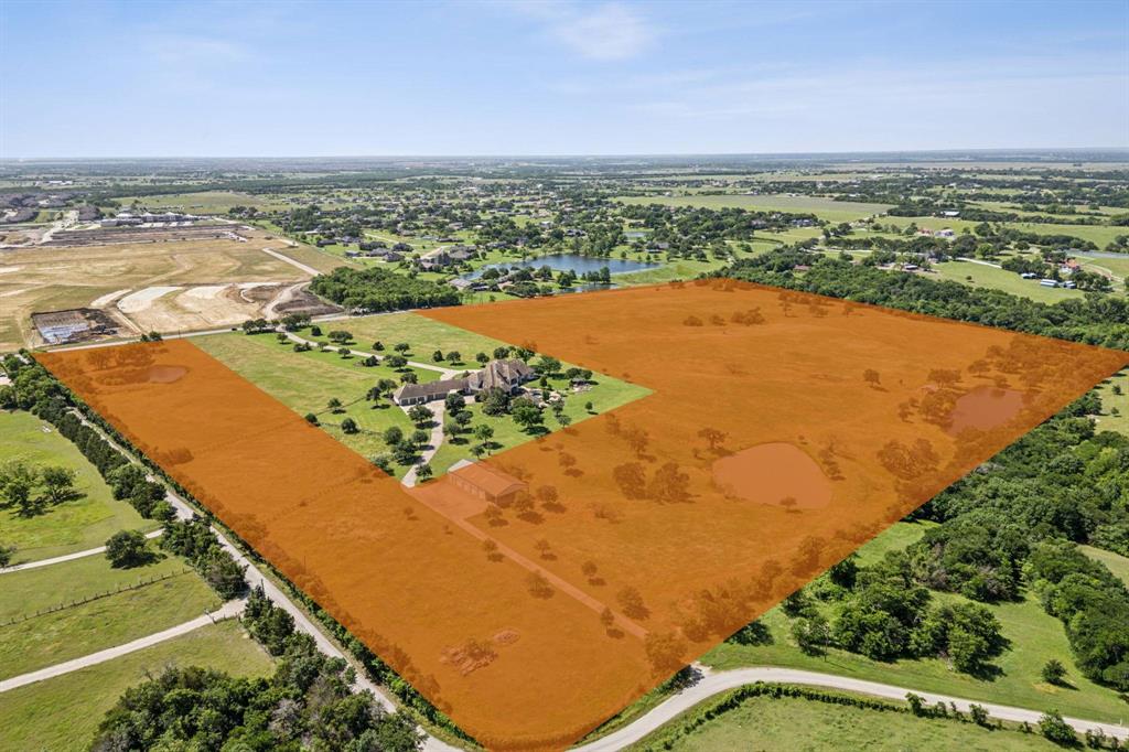 Prime 40-Acre Tract with Unmatched Skyline Views – Build Your Dream Estate or Develop the Future! Rarely does an opportunity like this come available — 40 pristine acres just 5 minutes from downtown Forney, offering spectacular elevation, panoramic views of the Dallas skyline, and endless potential. Tucked around a luxury estate, this private and secluded parcel is the perfect canvas for your future dream compound, family estate, high-end retreat — or a visionary development project. With gently rolling terrain that opens up to wide western vistas, this land is ideal for a custom home site with space for guest houses, workshops, barns, or recreational features. This rare tract of land is perfectly positioned for a future residential development, offering the flexibility to create everything from estate-sized one-acre homesites to higher-density communities. The possibilities are vast — this is a true developer’s canvas. Imagine waking up each morning to quiet country serenity, then ending your day with sweeping sunset views over the city skyline. Utilities are accessible nearby, and the acreage offers a versatile mix of open pasture and buildable land, ready to accommodate your vision. An additional 10 acres with an estate home is also available for purchase, further expanding the potential for both private and commercial ambitions. Whether you’re envisioning a gated luxury enclave, a mix of single-family homes, or a creative high-density project, this property delivers the setting, infrastructure, and demand to make your vision a reality. Enjoy the perfect balance of privacy and convenience — surrounded by nature, yet just minutes from shopping, dining, schools, and major highways. Don’t miss your chance to claim this remarkable 40-acre tract and create something truly extraordinary — for yourself or for generations to come.