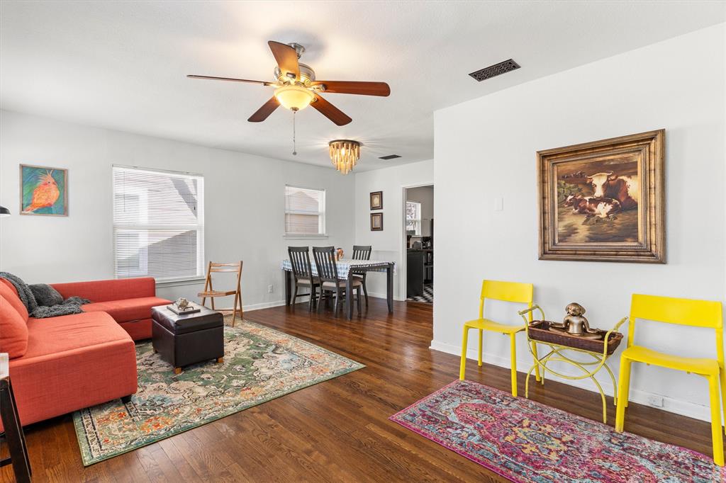 Charming, character-filled bungalow on a large corner lot. Natural light pours into the living and dining spaces, with a functional floor plan that feels easy and cozy all at once. The kitchen leans into its vintage charm with bold black-and-white checkered floors, gas cooking, playful cabinetry, and generous cabinet storage, plus a separate utility room that adds valuable function and flexibility. Two comfortable bedrooms offer options for guests, a home office, or creative space, while the bathroom maintains classic charm. An oversized garage provides covered parking and direct access to the backyard—ideal for added privacy, storage, or everyday convenience. Walkable to TCU and close to Magnolia Ave, the medical district, and some of Fort Worth’s favorite local spots, this is one of those homes that just feels good the moment you step inside. A great opportunity for parents of TCU students seeking a walkable off-campus option with independence today and long-term rental or resale potential for the future.