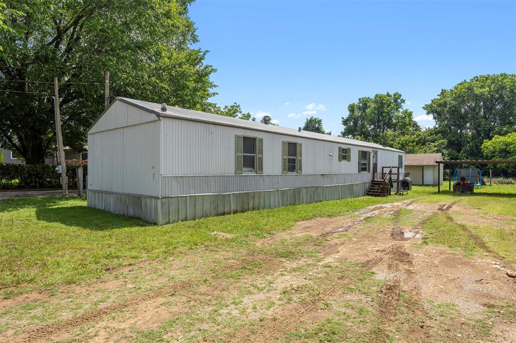 This home is part of 4 that are adjacent to each other, they can be purchased individually or together; MLS numbers are 21277507, 21277512, 21277520, 21277530.  This home is centrally located along FM 1187 in between Burleson and Mansfield with the designated schools being Burleson ISD. The home is on an oversized lot and features a carport and a shed while still leaving plenty of yard space! The inside of the home is freshly painted with neutral finishes throughout making it turnkey and ready for you! The home is tenant occupied so it requires 48-hour notice to schedule a showing.