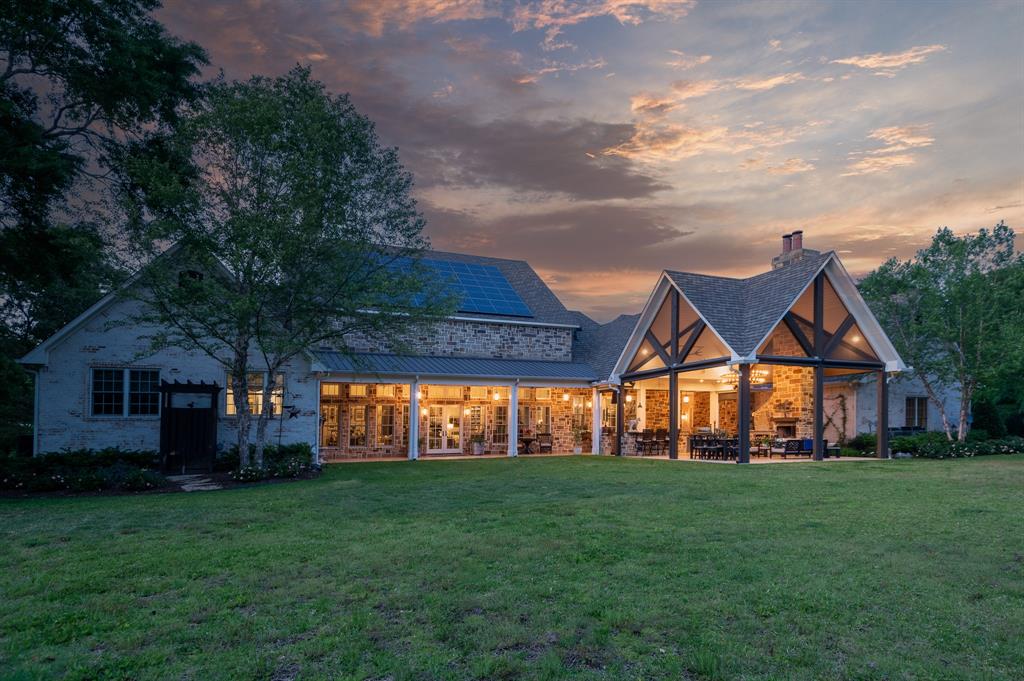 Nestled 2 hrs east of Dallas, 3 hrs north of Houston, near Jacksonville, TX, Timshel Farm is a 57-ac luxury ranch artfully combining the quiet East Texas countryside with sophisticated, modern living. The estate features a meticulously crafted main residence highlighted by rich antique details, including a chef's kitchen equipped with a custom Lacanche range & hidden pantry. Comfort extends with spacious great rm, luxury primary suite offering breathtaking farm views, & inviting outdoor living space complete w fireplace & full kitchen. Guests enjoy separate house w historic flooring & cozy wraparound porch. Equestrian facilities boast a five-stall barn, tack room & office space. Additional amenities include stocked pond, orchards, and custom garden shop, making this ranch not just a home but a retreat. This turnkey ranch offers a respite encased in the serenity of pine forests and open pastures, blending luxurious living with the timeless beauty of the Texas Piney Woods Region.
