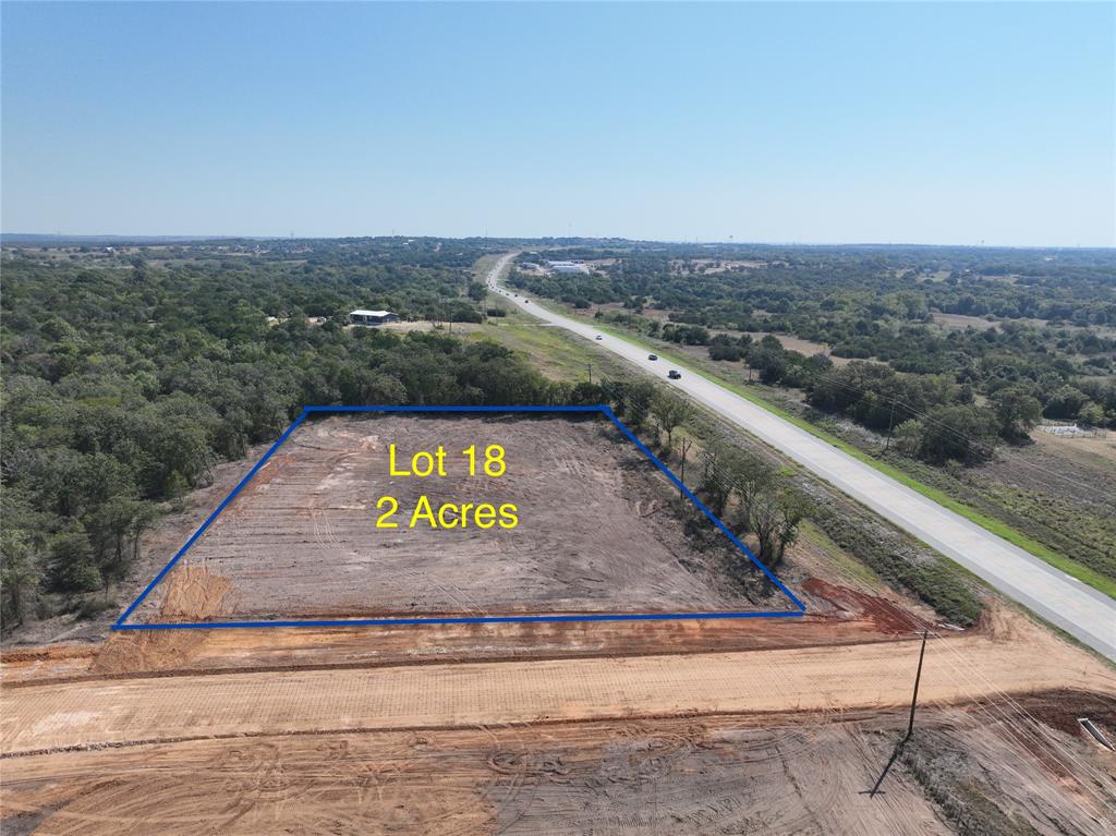 Strategically located in Weatherford, Texas, this exceptional commercial property offers a prime opportunity for business owners and developers. Situated on the highly traveled East Ric Williamson Loop, between Highway 51 and FM 730, these commercial tracts range from 2 to 4 acres and feature concrete road access. What makes this a truly unparalleled offering is its location outside the city limits, providing the significant advantage of no zoning restrictions and a simplified, no fuss development process without the typical bureaucratic hurdles of the city of Weatherford. This is an ideal location for any business seeking high visibility, easy accessibility, and the freedom to develop their property without city mandated limitations. A new water well has been installed on the property.