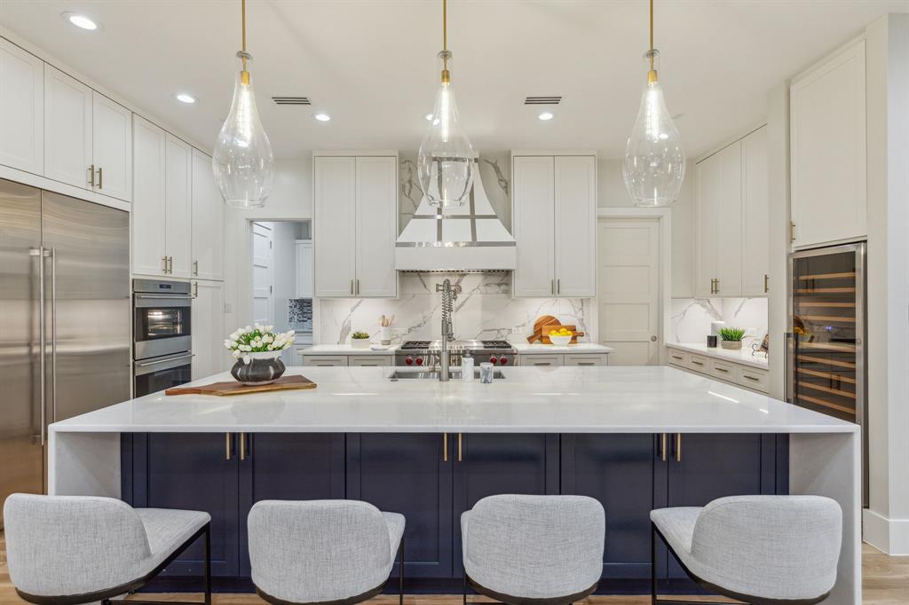 MOTIVATED SELLER - Indulge in luxury at this remarkable Preston Hollow home. Shows Like new! Contemporary sophistication and exceptional design greet you at the grand entrance, inviting seamless indoor-outdoor living. The open floorplan is perfect for entertaining, boasting a chef's kitchen and elegant master suite with a marble bathroom and fire glass fireplace. First floor offers a guest bedroom and the Primary bedroom. Each bedroom features an en suite and spacious walk-in closet. Thoughtful spaces cater to every lifestyle, even accommodating your four-legged friends with the pet bath in the laundry room. Additionally, revel in the convenience of a private office for remote work, a media room for entertainment, and a beautiful pool with an outdoor covered patio featuring an outdoor grill.