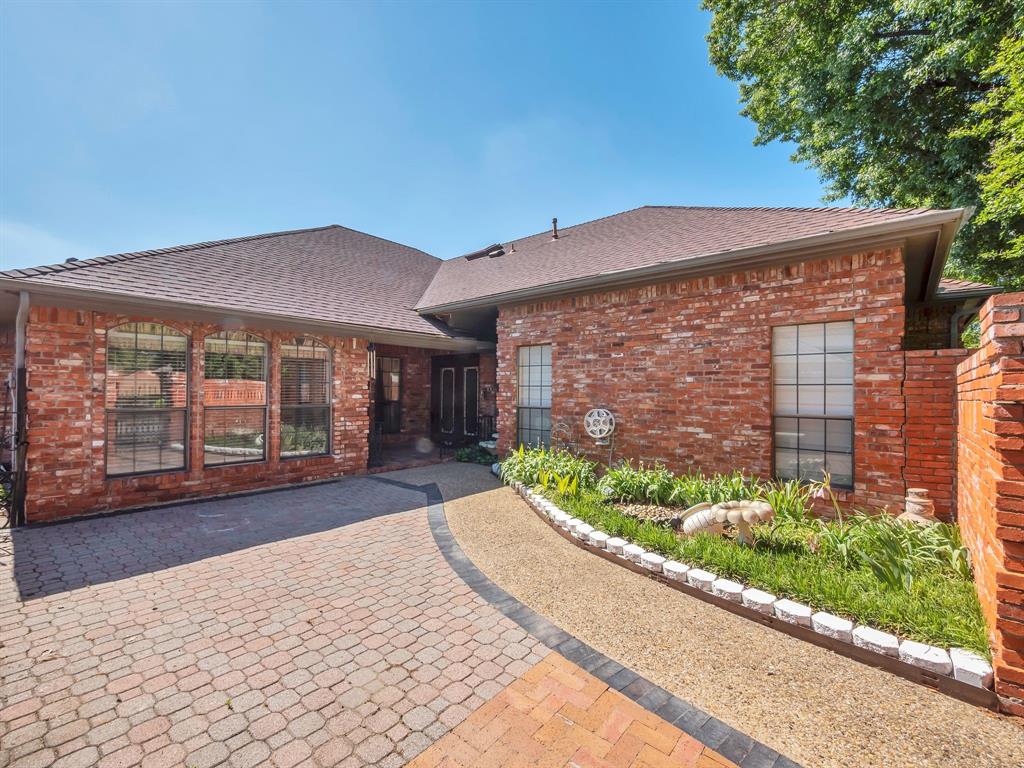 Beautifully maintained and updated 4-bedroom and 3-full bath 1-story home in the highly desirable Woodbridge Subdivision. Richardson ISD. Excellent curb appeal and charming private brick-laid courtyard. This home offers an open floor plan with soaring ceilings and a spacious living room seamlessly connected to the dining area and wet bar. The stunning kitchen features granite countertops, modern updates, and a cozy breakfast nook with views of the front private courtyard. A versatile flex room can also be used as a second living area or media room with sliding doors to the backyard. The home has a nice backyard with an extended patio with pergola cover, great for outdoor cookouts and activities. Tucked away near a quiet cul-de-sac with minimal traffic, minutes from local markets, shopping centers, and Hwy 635.