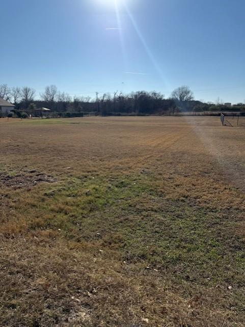This well-maintained cul-de-sac lot spans 1.017 acres in the highly sought-after Rolling Creek Ranch community. Residents enjoy exceptional amenities, including a secured gated entrance, two large bass-stocked ponds, a community pavilion and park, and sports fields featuring a pickleball court. Build your dream home with the freedom to choose your own builder and no mandatory construction timeline. A minimum home size of 1,800 square feet is required, helping preserve quality and long-term value throughout the community. Conveniently located just a short drive from Granbury’s historic square, which is proudly known as “The Celebration Capital of Texas.”