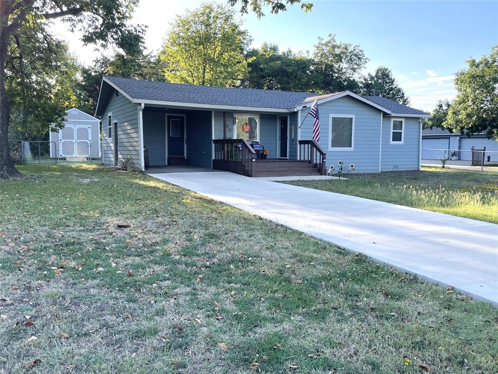 Welcome to Lake Tawakoni!  Looking for the perfect Weekend getaway or living the life on one of the best fishing lakes East of Dallas!  This beautiful, fully remodeled home, is the one for you!  Current owner purchased the home in 2023 and has updated everything including: New Roof, Electrical, Plumbing, Siding, Appliances, Water heater, HVAC, Cabinets, Flooring, Lighting, Paint, Countertops, New windows, and a 2025 Storage building!  Nestled in a very quiet, Lake and City Park access subdivision with NO HOA! 2 bedrooms, 1 bath with walk in shower, large utility room, Living Room, Dining area, and a flex room that could easily be a third bedroom.  Owner added large laundry room, approximately 100 sq ft. Kitchen appliances include, electric Range, Built-in Microwave, Refrigerator.  Utility room is oversized with room for storage and a freezer.  Washer and dryer convey with home.  Outside you will find an attached carport with access to the home, 10 x 12 storage building, fully fenced back yard with 2 gates.  All on over one-third of an acre!  Plenty of room to store your boat, build a shop, expand home footprint or entertain guest.  Enjoy the convenience of being a couple of blocks from the City Park and Boat launch ramp!  If golfing is your thing, Deer Run public Golf Course is a short 3 miles away in West Tawakoni. Only an hour from DFW Metroplex, Lake Tawakoni is a fisherman's dream, home to Blue Catfish, Channel Catfish, White Bass, Striped Bass, Hybrid Striped Bass, Largemouth Bass, and Crappie. Great recreational lake for boating, skiing, jet skiing, fishing and swimming. Don't miss this opportunity! Priced to Sell and won't last long!