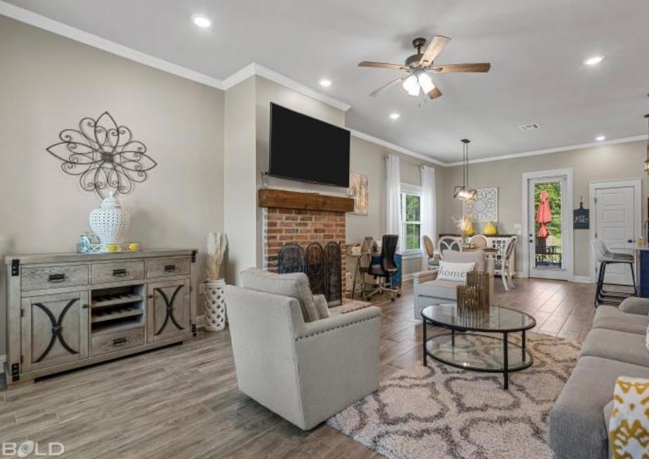 BRING ALL OFFERS!!! Welcome Home! This GORGEOUS 3 bed 2 bath beauty is better than new and has so much to offer! Built in 2021 and completed in 2022 located in well-established New Territory Subdivision, it features an open floor plan with a fresh neutral palette throughout and NO HOA. The kitchen has granite countertops and subway tiled backsplash, under counter lighting, pantry, dining area AND SEPERATE island as well as stainless steel appliances. The primary bedroom has tray ceilings with a private bathroom with double vanities, separate tub, shower and spacious walk-in closet. Tile and carpet floors are throughout this home. The backyard was built for entertaining with NO BACKYARD NEIGHBORS! It features an awesome outdoor covered (and extended) patio with a FIREPLACE! It's country living that's minutes away from I-49, I-220, North Market, shopping, dining and other local amenities. It also QUALIFIES for Rural Development (ZERO DOWN)! It's a MUST SEE, CALL US TODAY!!!