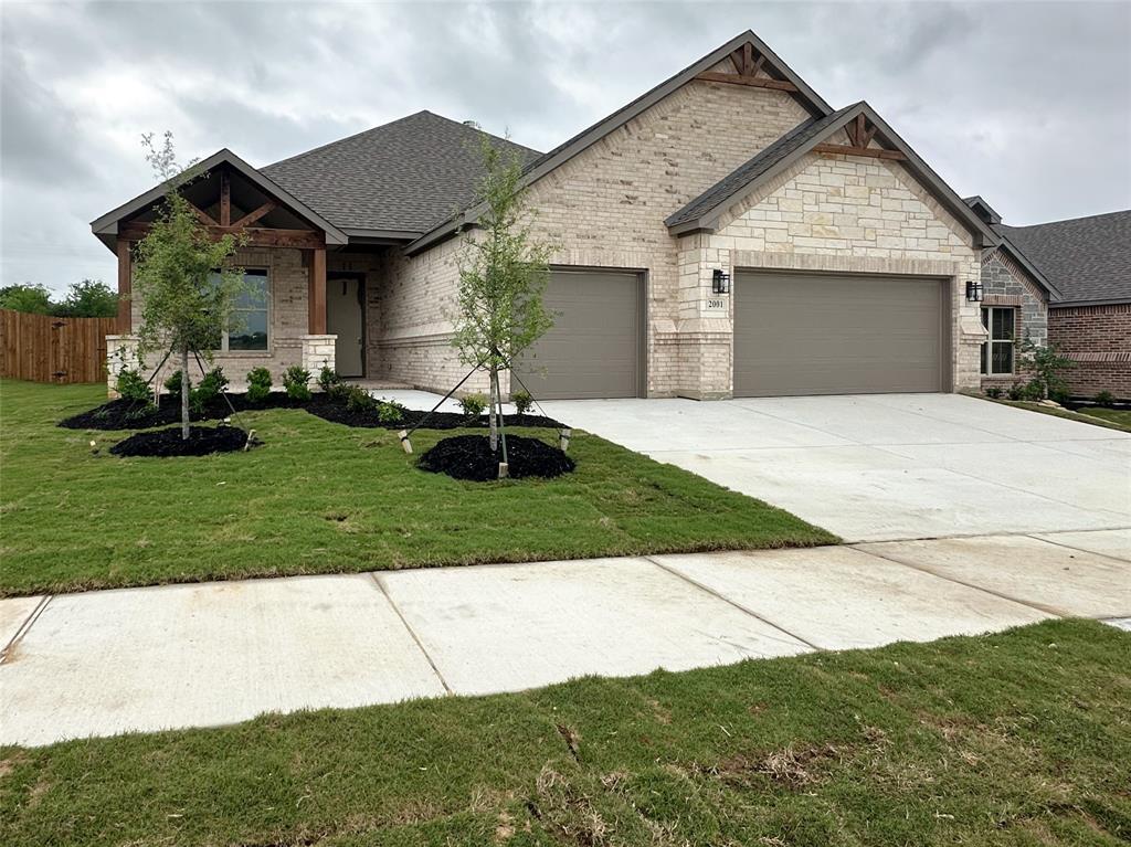 Seller is offering $7500 buyer incentives   This beautifully crafted home has a large open kitchen custom cabinetry with 42in uppers large granite island with undermount 50 50 sink and concealed trash cabinet. The stainless Whirlpool appliances make this kitchen a chefs dream Elevated ceilings with double crown molding in living area single stage in kitchen, dining, entry and primary. Oversized 5.25 baseboards throughout. Ceiling fans with light in living and primary, guest bedrooms are wired as well. Luxury water resistant vinyl plank flooring in the main areas and hallway. Full security system.  The grand entry way opens into the nice living room featuring large glass sliding door. Energy efficient windows throughout. Primary bathroom has fully tiled showers with accent flooring. The exterior is beautifully designed with brick and decorative stone. An insulated 2 car fully finished garage has neatly textured walls and baseboards. Encapsulated foam insulation for highest energy efficiency. A full sprinkler system landscaping with 2 trees as well as the nice size backyard. Corner lot.
