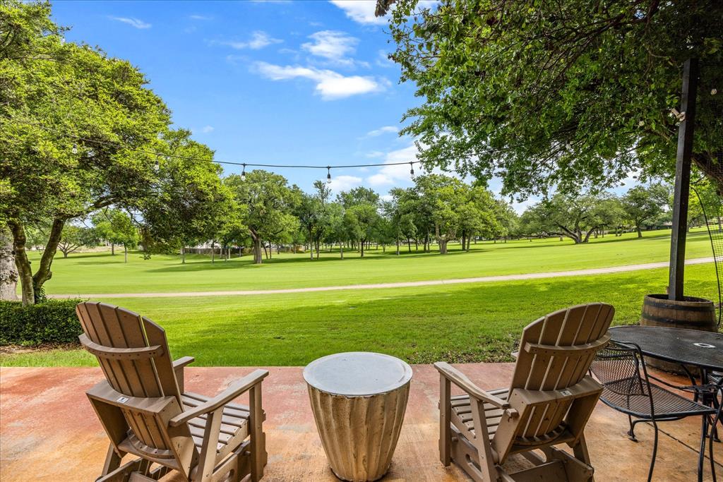 Located in the highly sought-after DeCordova Bend Estates community, this beautifully updated 3-bedroom, 3-bath townhome offers an open and airy layout filled with natural light. Recent updates include luxury vinyl plank flooring, new, fresh interior paint, updated kitchen cabinets, countertops, sink, new disposal, and a new washer and dryer, creating a modern, move-in ready feel. Enjoy peaceful golf course views from the spacious north-facing back patio and breezeway, providing shaded evenings perfect for relaxing or entertaining. Each bedroom features its own private bathroom, while the upstairs primary suite includes a private balcony and office area with scenic lake and golf course views. Additional features include an underground electric fence and convenient walking access to the clubhouse, tennis courts, and putting green.