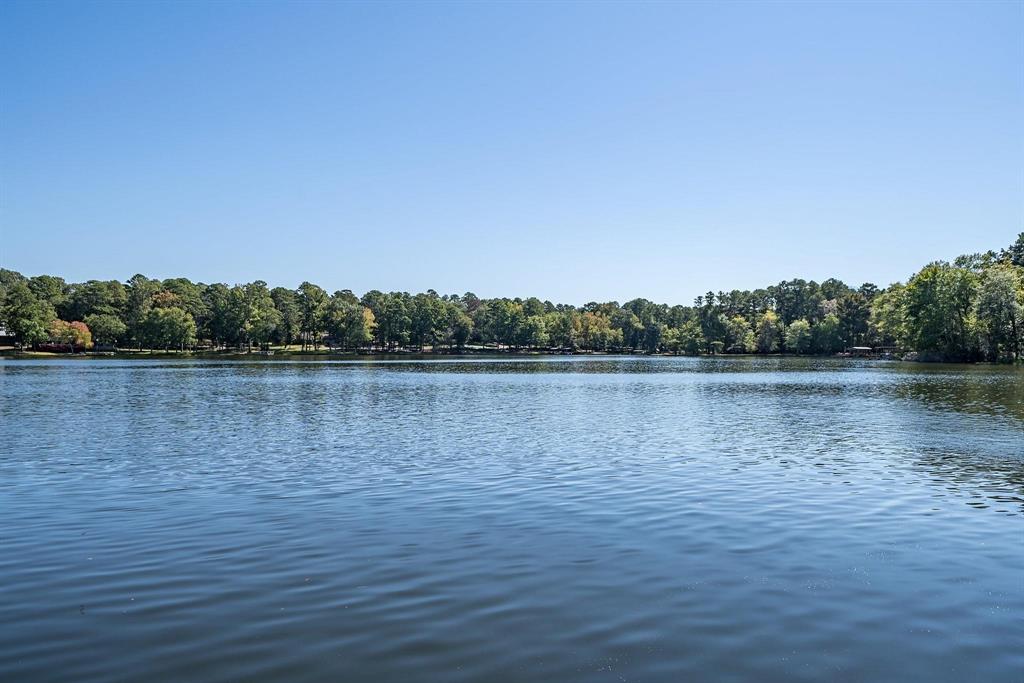 Lake Life is all about the view and this little cabin delivers one of the best on Brooks Lake. Situated on 2.5 lots this 2 bedrooms, 1.5 bath lake home offers a peaceful setting, gorgeous water views and endless potential for someone ready to make it their own. Inside, the kitchen has already been updated with granite countertops, new cabinetry, range and farmhouse sink giving you a solid starting point for future improvements. A spacious sun porch overlooks the lake and provides extra living space perfect for morning coffee, game nights, extra sleeping area or just enjoying the view year round. The home could use some further cosmetic updating but the bones are there.  Importantly, the HVAC was new in 2026 and the roof was replaced in 2019! The entire layout works well for a lake side retreat. Outside, the dock, deck and exterior reflect the homes vintage character. The main lake view is hard to replicate at this price point. If you have been searching for an affordable waterfront property with big views on a quiet fishing lake this is your opportunity. Brooks lake is a tranquil, no wake, private lake of approx. 70 acres. The lake is surrounded by over 700 acres of forest with trails managed for your recreational use and which can be accessed from your back door! Brooks is stocked with Bass and Crappie and a constant level is maintained. There is a voluntary POA that maintains the lake and roads. Come enjoy the peace of an owners focused community where short term rentals are not permitted.