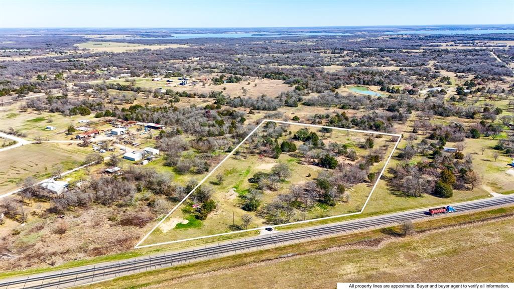 If you have been waiting for acreage with easy access, room to breathe, and proximity to the lake… this is it. This 8.66 (+-) acre tract in Mildred offers highway frontage along 287, giving you convenience and visibility while still enjoying that wide-open country feel. The property is fenced on 3 sides (and t-posts already in the ground on the fourth side) and ready for your plans — whether that’s building a home, adding a shop or barn, or simply investing in land with long-term potential. Scattered trees throughout create natural privacy while leaving plenty of usable space for a homesite and outdoor living. You can clear selectively or keep the tree cover for that peaceful, tucked-away feel. Located in highly sought-after Mildred ISD and just minutes from Richland Chambers Lake, you are close to boating, fishing, and sunset evenings on the water — while still having quick access into Corsicana and an easy commute thanks to 287 frontage. Space. Access. Location. This one checks boxes.