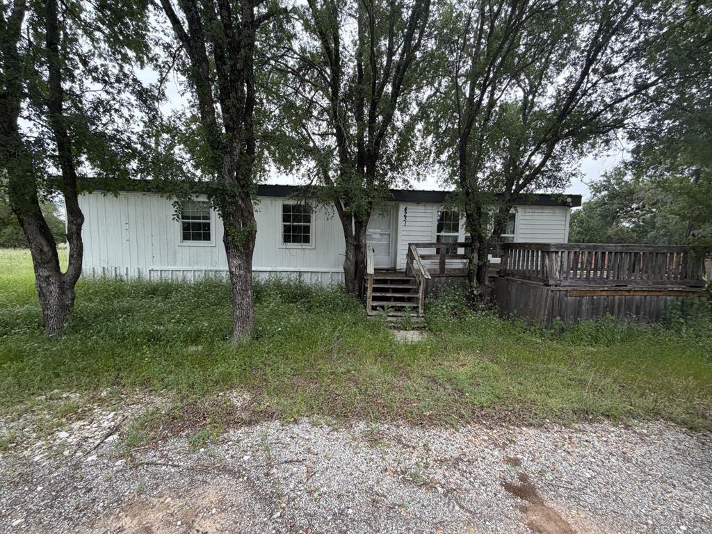 Investor special! Double lot with double-wide in need of extensive repairs or removal. Whether you're looking for a fixer-upper, investment opportunity, or a place to build new, the value is in the possibilities. Selling as-is.