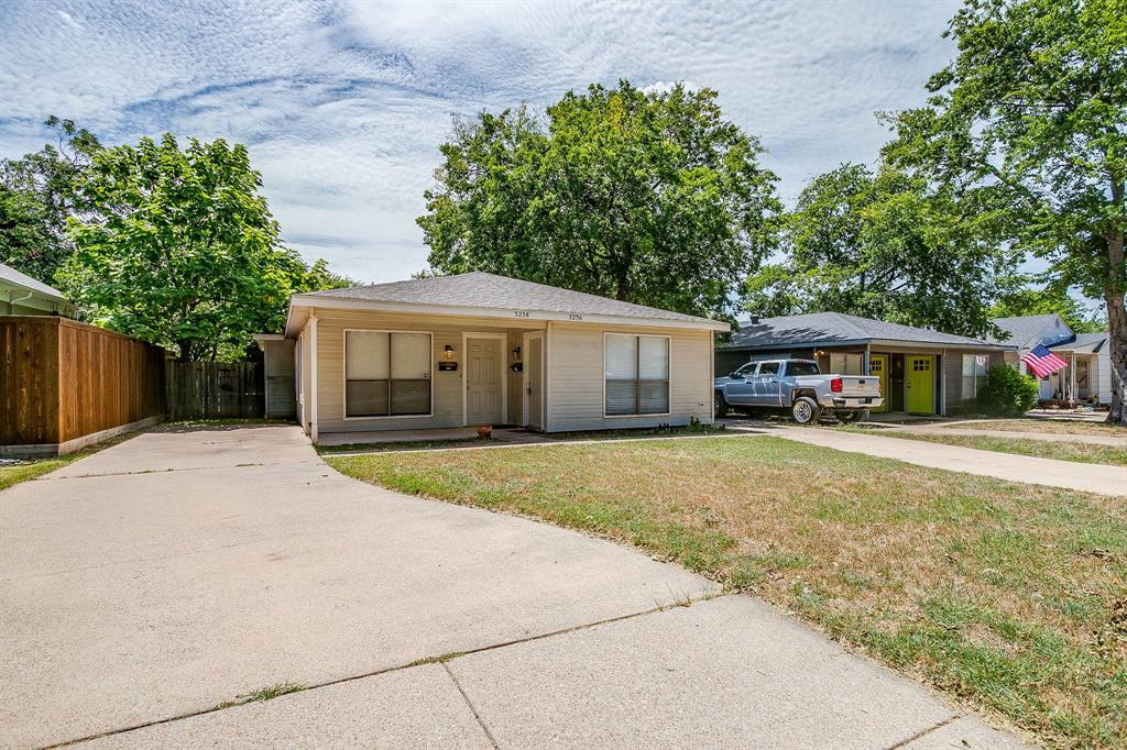 GREAT LOCATION!! Adorable duplex just blocks from TCU! This charming 4-bedroom, 2-bath duplex offers comfortable living with a spacious living room, dedicated dining area, and a well-equipped kitchen featuring abundant cabinet space and a pantry. New roof and air conditioner is 5 years old. Vinyl flooring flows throughout the main living areas, while the bedrooms offer cozy carpeting. Each unit has 2 bedroom 1 bath and a 2 car driveway. Enjoy the convenience of an included washer and dryer, a private 2-car driveway with off-street parking, and access to a fenced shared backyard. One side of the duplex has been updated with newer flooring and countertops, adding modern appeal. Located near excellent schools, shopping, dining, and local amenities, this property is ideal for investors or owner occupant  seeking a great location close to TCU.