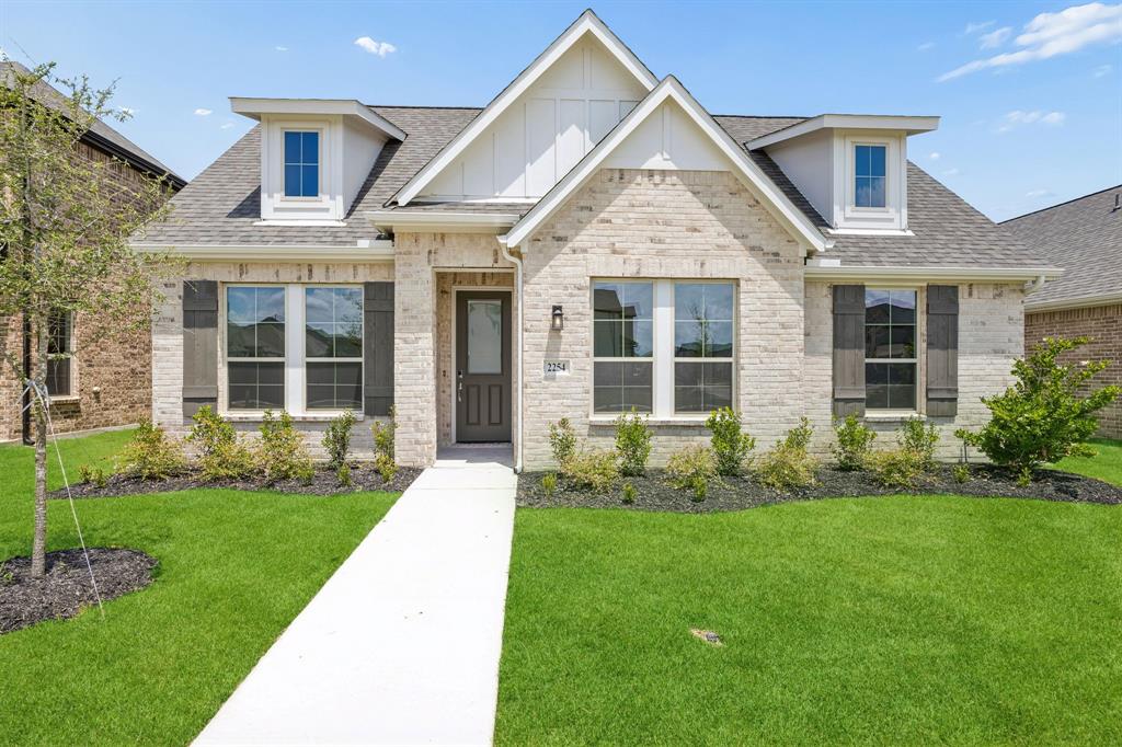 Centre Living Homes, an award-winning builder, welcomes you to your dream home in Waxahachie, TX! This bright & Spacious one-story home boasts 4 bedrooms, 2.5 bathrooms, and an open floor plan perfect for entertaining guests or relaxing with loved ones. The living room features vaulted ceilings, while the dining area and kitchen offer modern appliances, upgraded gas cooktop, ample counter space, and double pantries. The huge patio with vaulted ceilings, recessed lighting, and stained cedar finish is perfect for hosting summer barbecues or enjoying your morning coffee. This home is located in a new community with amenities such as a sparkling pool, multiple playgrounds, and green spaces. Don't miss out on this incredible opportunity to own a beautiful home in a fantastic community. Schedule your visit today!