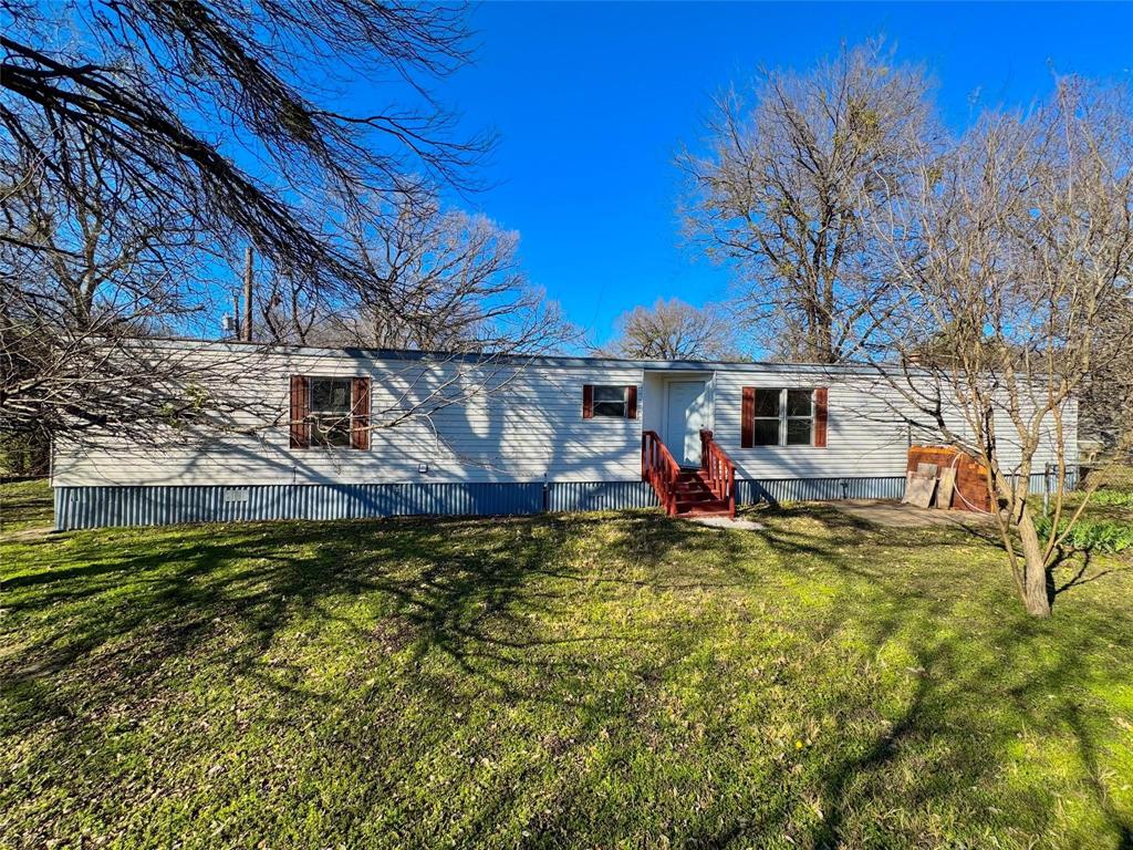 Welcome to this 3-bedroom, 2-bath single-wide home sitting on over a third of an acre. The open-concept floor plan provides a seamless flow between the living room, dining area, and kitchen, making it both functional and inviting. Conveniently located just off Azle Highway, this home offers easy access to Fort Worth, Weatherford and Azle.

Located outside city limits, this property benefits from lower property taxes while still being close to nearby amenities.

The property next door is also available for sale (2014 Spring Ct, Azle, TX 76020), presenting a rare opportunity to own two side-by-side homes. Combined, the lots offer plenty of space for a family compound, multigenerational living, or an investment setup, live in one and rent the other, or rent both for steady income.