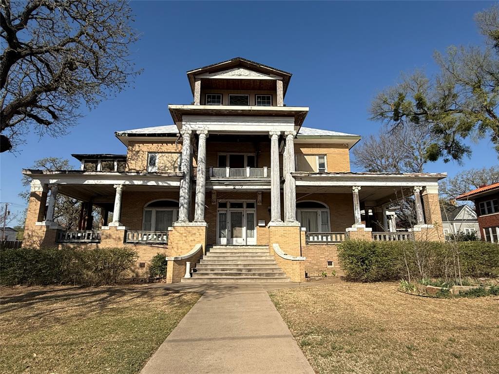 An American Four Square home built in 1911 exudes timeless charm and craftsmanship, reflecting the architectural simplicity and practicality of the early 20th century. Situated on a spacious 0.837-acre lot, this classic home features a symmetrical, boxy design with a hipped roof, wide eaves, and a welcoming front porch, often adorned with sturdy columns. Large, evenly spaced windows allow for abundant natural light, while the interior showcases original woodwork, hardwood floors, and a functional layout with four well-proportioned rooms per floor. The expansive lot provides ample space for gardens, outdoor gatherings, 960 square feet separate apartment, blending historic charm with modern potential.  1800 Sq ft Shop with updated Electrical. Home is in need of renovations.  Owner has had the foundation repaired. So much Potential.  Walking Distance to Downtown and Baker Hotel. 
Garage Apartment completely updated and rents for 900.00 per month.