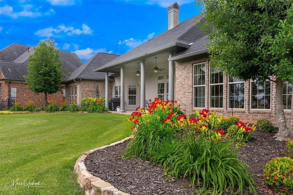 SELLER is offering a $10,000.00 floor allowance with acceptable offer. Welcome to this prestigious 24 hour guard gated community of Stonebridge. Perfectly positioned on the 18th Tee with gorgeous fairway and tranquil pond views from 16 windows across the back of the home. This one story spanning 3070 sf, three car garage, 4 bedrooms, 3 full bathrooms offer high end finishes and professionally executed total transformation from walls and millwork to cabinetry, fireplace, built-ins, and architectural details, almost every surface has been completely refinished. The exterior has been equally elevated, resulting in a home that feels cohesive, polished, and truly turnkey. New custom fixtures throughout. Designer kitchen, dining, living, and utility rooms have been beautifully updated showcasing Fab Stone Elite custom quartz countertops, vintage stone natural backsplash, custom crisp white cabinetry with gold trim, elegant gold hardware, and impressive suite of Cafe appliances. Also, includes walk-in pantry, butler's pantry, and breakfast bar connects the kitchen to the dining area creating a flow for gatherings both large and intimate. Lavish primary suite with elegant sitting area and patio access; spa-like bath with jetted tub, separate shower, dual sinks, and two walk-in closets. Large covered patio that defines relaxation. New landscaping, 2025 AC, 2 Tankless HW Heaters (1) is 2025  a Reverse osmosis system, separate water purification system. Enjoy the amenities of Stonebridge Community premier neighborhood - security, clubhouse, tennis courts, pickleball, fitness, community pool, 18 hole golf, scenic ponds. This is a rare opportunity to own a luxury single story home on the golf course where elegance, comfort, and breathtaking views come together effortlessly.