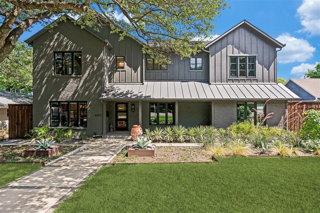Expanded and updated deep Lakewood five bedroom with downstairs master and gleaming pool and turfed yard. Tucked beneath a canopy of mature trees in coveted Lakewood, this beautifully remodeled home blends timeless charm with elevated design. The layout is both functional and serene, featuring a first-floor primary suite and private guest room. A welcoming foyer opens to a light-filled dining room and study with builtin cabinetry.  The heart of the home is a chef’s kitchen equipped with Thermador appliances, a large island, and seamless flow into the spacious living area with warm fireplace and builtin cabinetry. The first floor is completed by large laundry and attached two car garage. The second floor has  three en-suite bedrooms, one of which has a secret room behind the hidden shelves! In addition the second floor has a powder bathroom with designer wallpaper and desk area . Outdoors, enjoy a private oasis with a large living area, fireplace, resort-style pool and spa, turfed yard, and lush landscaping. Additional highlights  EV charging and a gated rear drive for added privacy. Ideally located near Lakewood Elementary and White Rock Lake. Enjoy