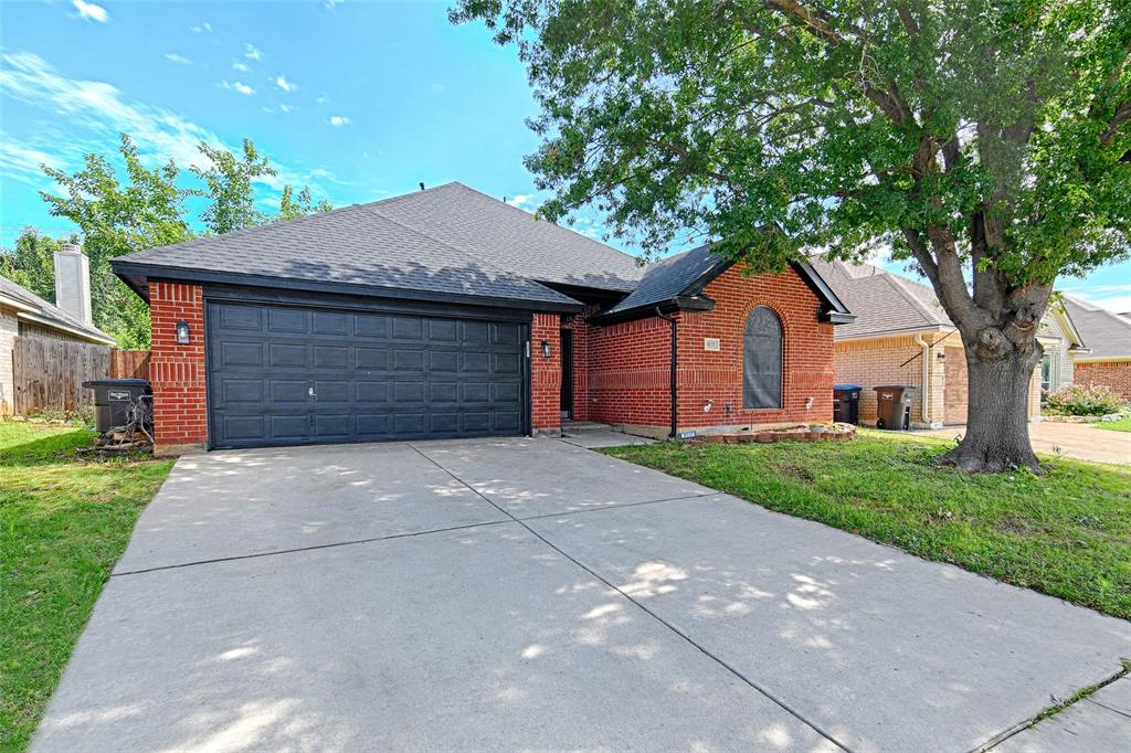 This pretty home in the River Trails Add has had numerous and recent updates throughout and is Move-In ready for a new owner. Beautiful, new LVP flooring throughout the living areas that are enhanced by new decorative lighting, freshly painted walls, trim and ceilings in neutral, current colors. The generously sized living room could accommodate two seating areas, accented by a vaulted ceiling, wood burning fireplace and large bank of windows, bringing in so much natural light. The dining area has both a breakfast bar and room for a very large table and chairs and looks into the back yard. Do you enjoy gathering in the kitchen? This one is it. The stainless-steel appliances are new and set off by the very cool, current backsplash, glossy counters, and hardware, all ready for you to start creating meals and memories. The primary suite has room enough for a desk or sitting area, while the primary bath has separated vanities with new counters, painted cabinets, lighting and faucets. The generous sized soaking tub, shower, linen and walk-in closets round out the space. The secondary bedrooms also have good closet space and wonderful light from the large windows. The garage and exterior trim, including the downspouts have been recently painted to make the red brick exterior really stand out. The large back yard has an open patio, grass, a nice shade tree and a handy storage shed, just waiting for your vision. This home is well situated in a quiet neighborhood, with both freeway and many other convenient routes to shopping, downtown activities, parks and schools. See what this home has to offer. The refrigerator will convey with this home. New roof Fall 2025.