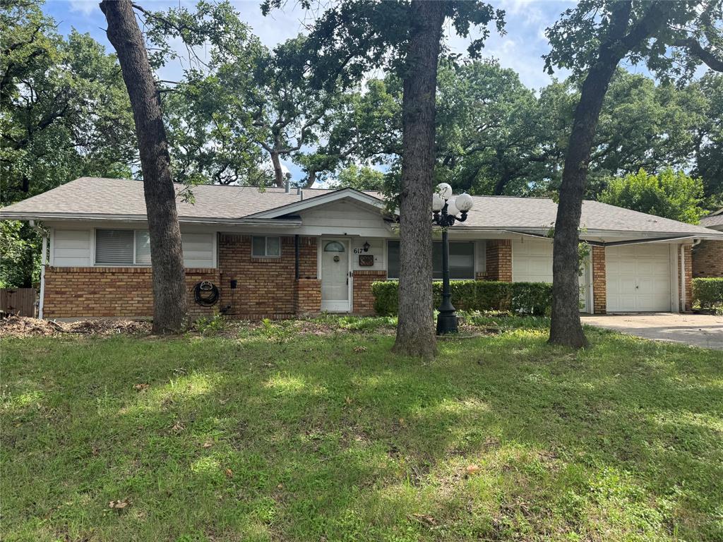 This is your opportunity to live in a well-established Hurst neighborhood with mature trees, a larger lot, yet minutes to dining, shopping, highways, parks, DFW airport.  If you're wanting to come home and relax or are a gardening enthusiast this home features a greenhouse, enclosed glass back porch sunroom with a fenced backyard. This home has been partially updated with modern laminate flooring throughout except in the bathrooms which have tile flooring. The kitchen boosts a new kitchen sink, new faucet, updated counters, with newer cabinetry partially installed. Refrigerator, washer, gas dryer, dishwasher, electric range will remain. A new roof was installed January 2026. 
There is no guarantee of accuracy and information is subject to change. Prospective buyers should do their own research and due diligence, including measurement of the property's square footage or land measurements.