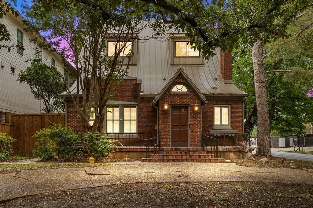 Step into a one-of-a-kind architectural gem filled with character, warmth, & endless potential. Surrounded by mature trees & tucked behind an inviting front elevation, this distinctive home offers dramatic spaces rarely found in today's market, including soaring vaulted ceilings, multiple fireplaces, expansive living areas, & an incredible third-floor primary retreat that feels like a private loft escape. 

Home's unique design blends timeless charm with a cozy storybook feel, while oversized windows & abundant natural light create an inviting atmosphere throughout. Spacious living & entertaining areas flow beautifully from room to room, offering flexibility for gatherings, relaxing evenings, or creative redesign opportunities.

Backyard patio provides a peaceful setting ideal for entertaining or enjoying quiet mornings beneath the trees. Kitchen features generous cabinetry, commercial-style appliances, & ample space to create a truly spectacular chef's kitchen. Multiple bedrooms & flexible-use spaces allow room for guests, home offices, hobbies, or multi-generational living.

Located in the desirable Oak Lawn-Turtle Creek area, this property offers convenient access to the DNT, Downtown Dallas, Uptown, shopping, dining, & entertainment. Enjoy being within walking distance to Bob's Steak & Chop House while still enjoying the charm of a quiet, tree-lined street. A circular drive enhances both curb appeal & functionality. While the property offers incredible charm and architectural appeal, buyers should expect cosmetic updates & renovations that would further elevate the home & maximize its full potential. This is a rare opportunity to personalize a truly memorable property in one of Dallas' most sought-after neighborhoods.

Some listing photos have been virtually staged to help illustrate the home's potential & functionality.  Seller DOES NOT ACCEPT BLIND OFFERS, escalation clauses, LOI, or assignments (which means ALL INVESTORS MUST VIEW THE PROPERTY WITH