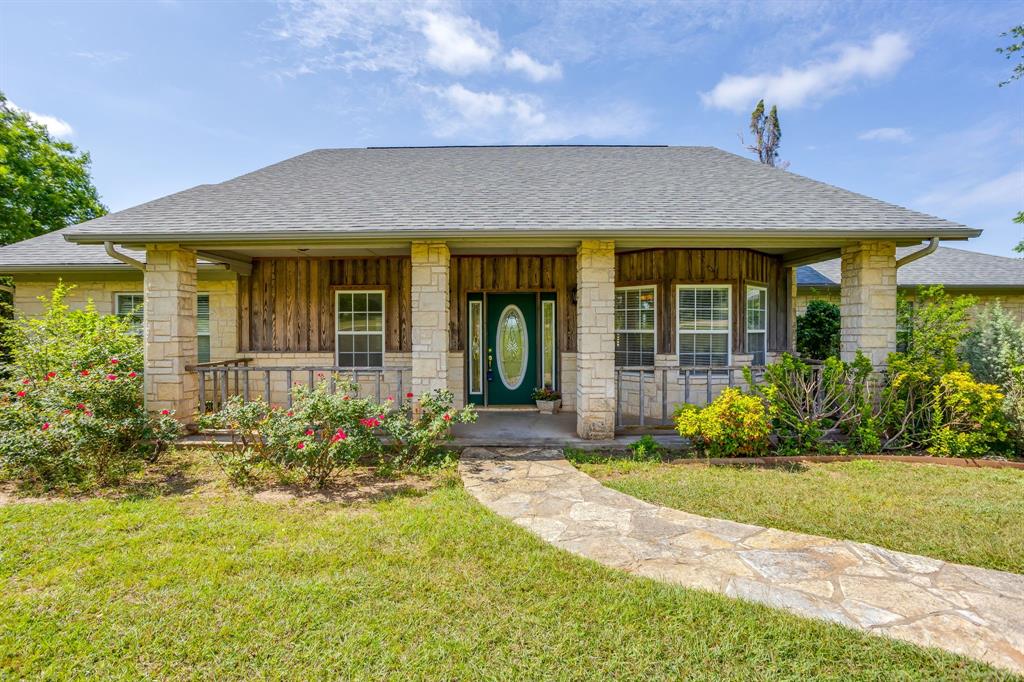 PRICE ADJUSTMENT PLUS $30K SELLER'S CONCESSION! Use the $30K on upgrades to the home OR $ towards closing costs OR to buy down your interest rate! This gem is ready for a fresh vision and an opportunity to update finishes and decor. The home is in the coveted Blue Branch Ranch gated community with 3 bedrooms, 2.5 bathrooms, designated office and 2 dining areas. Built in 2002 this spacious home sits on over 2 acres with a 30'x28' barn and a massive 32'x32' garage. The barn and garage allow for plenty of space for cars, hobbies, storage and so much more. The home was well-built with steel construction framing throughout the home. The kitchen is warm and welcoming with an abundance of storage, corian countertops and ready for entertaining.  Cozy up around the wood burning fireplace in the living room overlooking the beautiful 2 acre view. The large primary bedroom has an inviting sitting room ready for drinking coffee or reading on quiet mornings and evenings. The secondary bedrooms are oversized with an abundance of storage in both rooms. NEW ROOF April 2026!