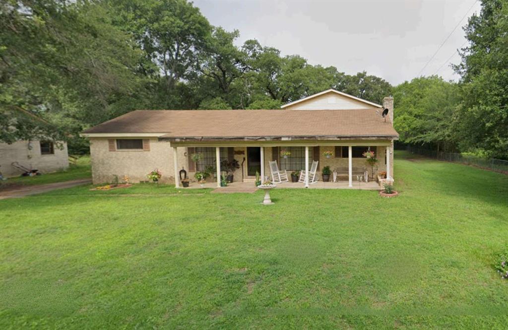 Investor Special - Located within Malakoff city limits on a large lot backing to expansive cattle-grazed acreage, this property offers strong upside potential for a full renovation project. The home features a brand-new roof with warranty, an updated HVAC system, and an oversized 2-car garage—solid fundamentals that set the stage for a profitable remodel. The interior needs a complete renovation, making this an ideal opportunity for investors looking to add value through updates. With original hardwoods under the carpet, a large den with fireplace, and a spacious loft-style suite with private bath, the layout provides flexible options for redesign or reconfiguration. Outside, the deep backyard with mature trees offers room for future enhancements or outdoor living improvements. This property is priced for investors and ready for transformation. Submit your offer - don’t miss this chance to secure a high-potential project in a convenient Malakoff location.