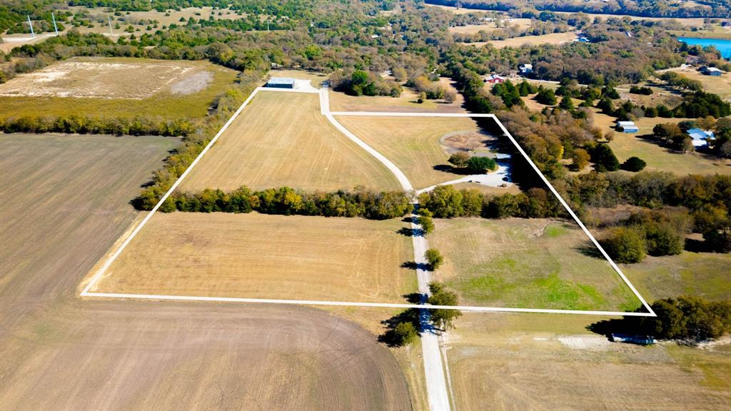Discover a rare opportunity to own 13.36 acres of ag exempt property in a rapidly growing area of North Collin County. This property offers open pasture currently producing hay and supported by bees for continued agricultural valuation. Located just north of downtown Anna, the property provides a balance of rural living and proximity to development, services, and major transportation routes including US 75 and SH 121 for straightforward access to the Metroplex.

The home features approximately 2,162 square feet of living space, built in 1996, and includes 4 bedrooms, 2 full baths, and a dedicated office. The floor plan provides a traditional layout with defined spaces and a comfortable flow. The surrounding acreage offers potential for continued agricultural use, expansion of current operations, livestock, hobby farming, or long-term investment hold in a growth corridor experiencing strong residential and commercial momentum.

Anna has consistently ranked among the fastest growing communities in the region, with ongoing residential development, improving infrastructure, and increasing buyer demand for homes with land. This property offers the flexibility to enjoy country living while benefiting from the accessibility of nearby city amenities, schools, and employment centers. The setting provides open views, privacy, and usable land with minimal slope or unusable terrain.

A unique opportunity to secure acreage with an existing home in a location positioned for both current enjoyment and future potential.