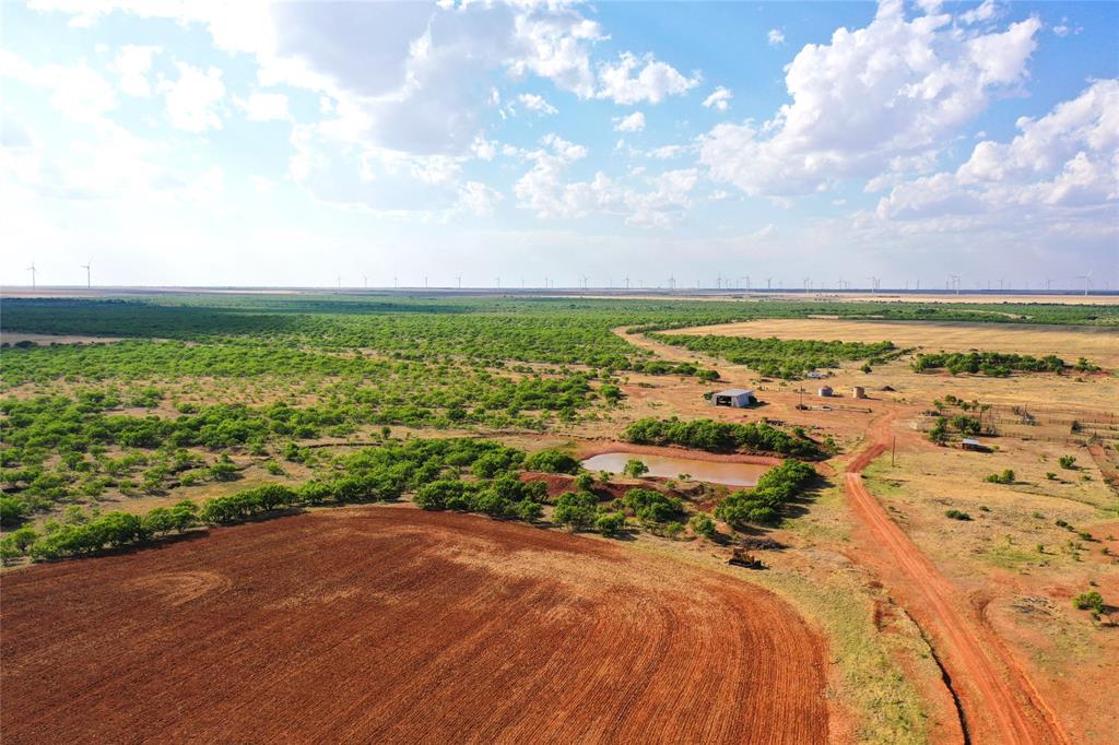 Discover an exceptional opportunity to own 2,779 acres of highly sought-after land in Haskell County that truly represents the pinnacle of versatile West Texas ranch ownership. This remarkable property is the epitome of multi-purpose functionality, offering an outstanding balance of productive pasture and cultivation that creates the ideal dual-purpose operation for both livestock and recreational use. Meticulously cared for and expertly managed over the years, the ranch is in exceptional condition with numerous improvements already in place, including newer fencing and cross-fencing, working pens, barns, and infrastructure designed for efficiency and ease of operation. The property boasts an excellent cow-calf carrying capacity, making it well-suited for cattle operations and continued agricultural productivity. Two water wells and electricity are already in place, adding to the property's functionality and convenience. Beyond its agricultural appeal, the hunting opportunities are truly second to none, with abundant wildlife including whitetail deer, dove, quail, ducks, hogs, predators, and migratory birds such as geese and sandhill cranes. Whether you are searching for a productive cattle ranch, premier hunting destination, investment opportunity, or a legacy property to enjoy for generations, this outstanding Haskell County ranch offers unlimited potential and the very best of West Texas living.
