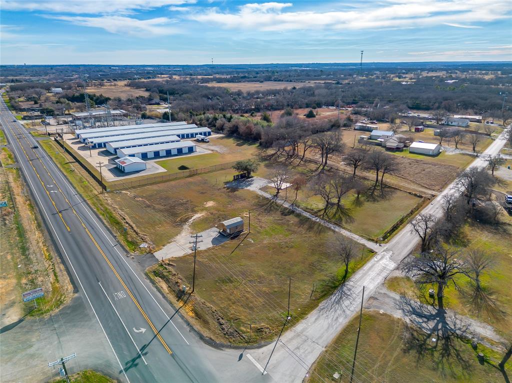 This property has Water, Septic, and Electricity. The property has a total of 1.97 Acres. There is Apx. 248 feet of road frontage on FM 917 and apt. 279 feet of frontage on County Road 1022. This corner property is minutes from the Chisholm Trail Tollway and is approximately 2 miles from State Highway 174. This parcel is in the City Limits of Burleson and is currently zoned as Agricultural. This property is in a Commercial corridor of FM 917, FM 1902 and Chisholm Trail Parkway