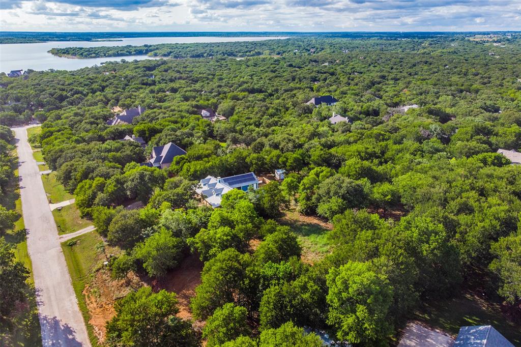 Premier luxury lot in the highly sought-after community of Emerald Sound. Heavily treed interior lot. The topography of Emerald Sound brings an amazing opportunity to design and build a beautiful one-of-a-kind home with all that you can imagine. The neighborhood has a nature trail and access to a nearby marina. Select your own builder. Building plans must be approved by HOA Architectural Committee. Close proximity to dining, shopping, and Lake Lewisville makes this location irresistible.