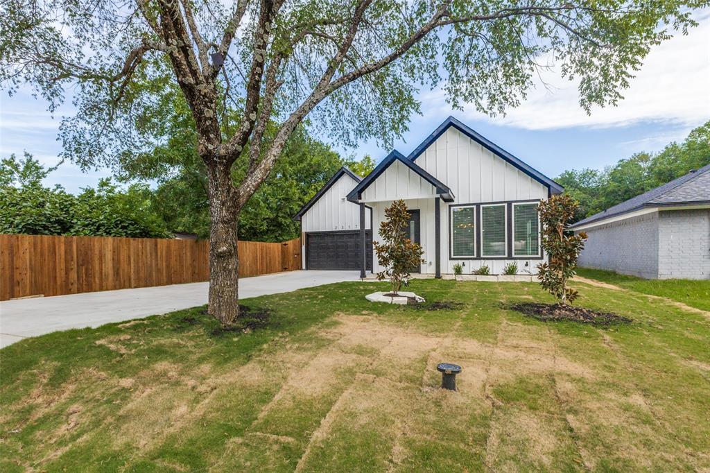 Step into this stunning BRAND-NEW construction offering 1,976 sq ft of thoughtfully designed comfortable living space on an oversized lot! This 4-bedroom, 2-bath beauty combines modern style with everyday practicality, creating the perfect place to call home. From the moment you walk in, you’ll notice the tasteful, relaxing color palette and beautiful light fixtures that add warmth and character throughout. The open-concept layout centers around an amazing kitchen featuring tall custom cabinets, gorgeous quartz countertops, generous storage, and a stainless steel and black stove, microwave, and dishwasher—ideal for cooking, entertaining, or casual family meals. The inviting living room, highlighted by a sleek electric fireplace, sets the stage for cozy evenings and memorable gatherings. A super-convenient mud room helps keep everything organized as you come and go. Retreat to the spacious primary suite and well-appointed secondary bedrooms that offer flexibility for guests, a home office, or hobbies. Both bathrooms are stylish and functional, perfectly in tune with the home’s modern design. Outside, enjoy covered patio and a fully fenced backyard with a wood privacy fence—perfect for pets, play, or relaxing weekends at home. The 2-car garage adds storage and convenience. Located just minutes from I-635 and I-20, commuting, shopping, and dining are all within easy reach. And with the peace of mind of a builder’s warranty, you can simply move in and enjoy your brand-new home from day one.