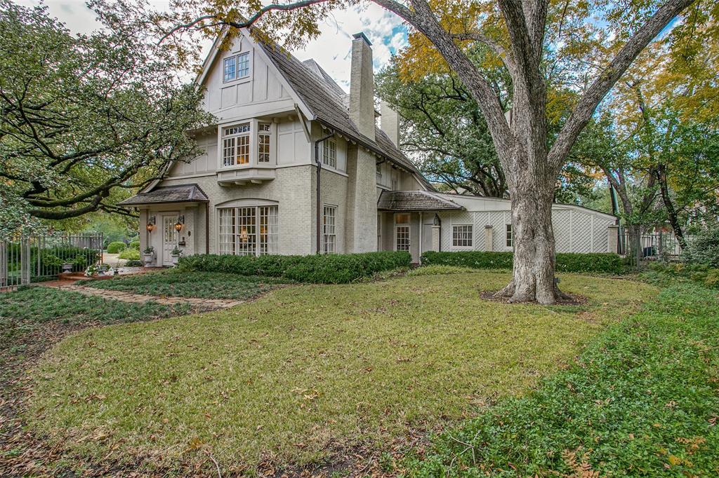 A cherished family home for almost 100 years. This historic treasure sits on an exclusive cul-de-sac in University Park, ideally located between Preston and Hillcrest. Made up of 5,301 square feet on a .55 acre lot, this four bedroom home features 4 fireplaces, a study, a large pool and still has so much room to roam or expand onto. This stunning Tudor offers high vaulted ceilings with a light, open and airy feeling. Lovingly maintained, the original residence was one of the very first houses in the Volk Estates. Turtle Creek once flowed through a portion of the property and is still witnessed by a lovely retaining wall and an elegant walkway where the water used to be. As you walk through the house, you will notice its infrastructure was built in a circular style offering panoramic views from all three floors. It is warm and charming - an incredible opportunity for someone who wants to live in the Volk Estates.