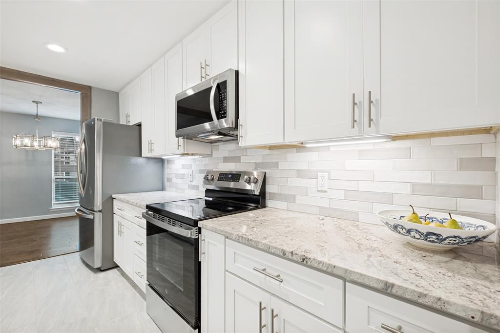 SELLER OFFERING $10K TOWARDS BUYER'S CLOSING COSTS WITH ACCEPTABLE OFFER! HOA INCLUDES ALL UTILTIES (except cable & internet).
First-floor urban oasis that brings the ultimate Dallas vibe! Step inside and you’re instantly greeted by a bright, open floor plan loaded with modern upgrades—we're talking chic recessed lighting, a fresh neutral color palette, seamless engineered wood flooring, and elegant ceramic tile. The fully modernized kitchen offers sleek granite countertops, newer cabinetry & under cabinet lighting while the convenience of a full-size, in-unit washer and dryer makes daily life a breeze. Updated bathrooms with modern tiling, marble top vanities & walk-in shower. But the real magic happens when you step onto your private patio, featuring a spectacular, custom Dallas cityscape mural that’s practically begging to be the backdrop for your morning espresso or weekend happy hours. Location-wise, you are right in the thick of it—just minutes from US-75, Whole Foods, SMU, and the absolute best dining and shopping the area has to offer. Complete with a sparkling community pool and two covered assigned parking spaces, this gem offers the effortless, upscale lifestyle you’ve been searching for.