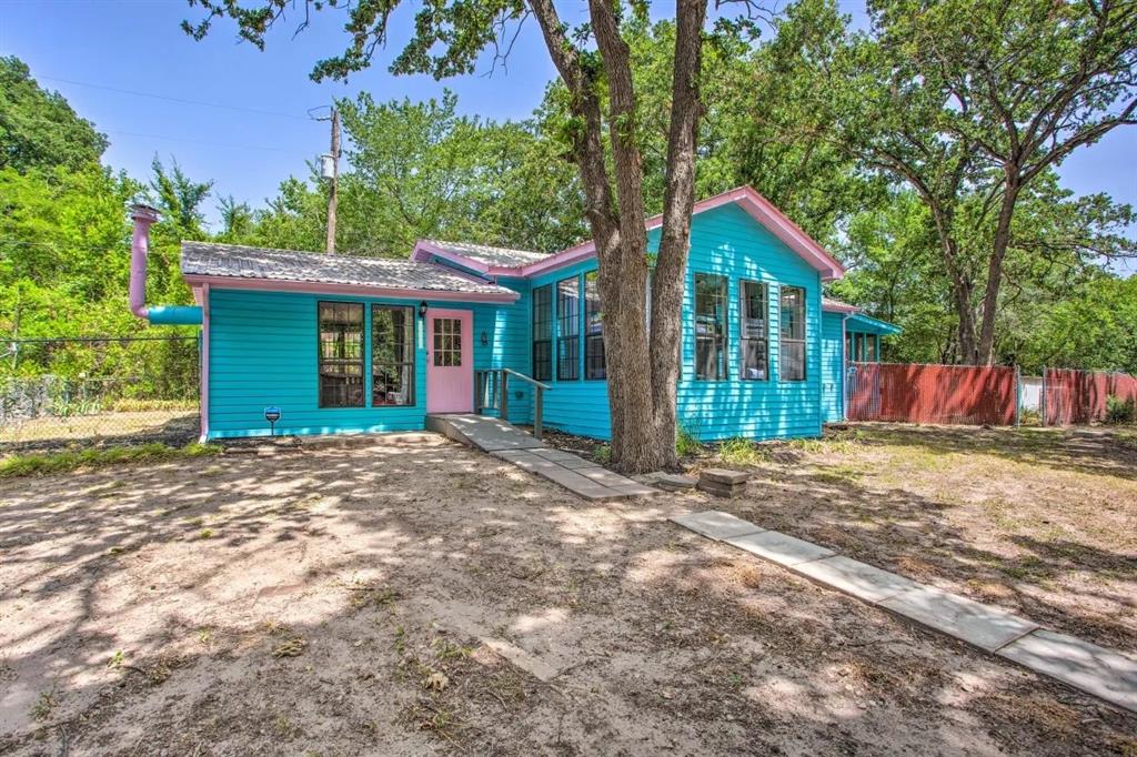 Discover your own LAKEFRONT retreat with a beach style, a peaceful hideaway where you can cast a line before your morning coffee. Located on 5 lots totaling .58 acre plus leaseback land! This inviting 2 bedroom, 2 bath home blends comfort with true waterfront living, offering direct access to beautiful Lake Tawakoni. Tucked away at the end of a dead end street, the property delivers exceptional privacy along with stunning views and a spacious yard perfect for relaxing or entertaining. The home is warm, charming, and move in ready, making it an ideal choice whether you’re seeking a weekend escape, a full time residence, or a smart investment opportunity for a vacation rental. Screened in porch, treed lot and firepit for outdoor relaxing. Property has a storm shelter. Home has been remodeled inside and out and is ready to welcome its next owner. Currently used as a VRBO. All information is approximate, buyer and buyers agent to verify information.