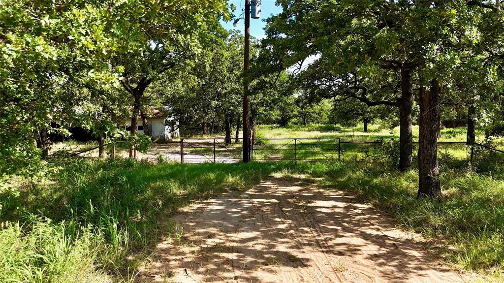 Discover an unparalleled opportunity to own 22.5 acres within the prestigious Nocona Hills, Montague County, Texas. A premier gated community offering an idyllic blend of luxury, recreation, and tranquility. This expansive parcel provides ample space to create your private sanctuary amidst the natural beauty of North Texas. Nocona Hills includes a 24-hour guarded and gated entry, ensuring ultimate security and peace of mind. Golf enthusiasts will delight in direct access to an immaculate 18-hole golf course, offering endless opportunities to perfect their swing. For the avid angler, Lake Nocona, consistently ranked as the 4th best bass fishing lake in Texas, is just moments away, promising exceptional fishing experiences. Residents and their guests also enjoy the convenience of a dedicated campground and RV park along with an airport for private prop planes. While offering a serene escape, this remarkable property remains easily accessible, just a two-hour drive from the bustling DFW Metroplex. Everyday conveniences like grocery stores and gas stations are close by, providing the perfect balance of rural serenity and urban accessibility. Embrace the chance to build your dream home or a private retreat in this sought-after community, where every day feels like a vacation.