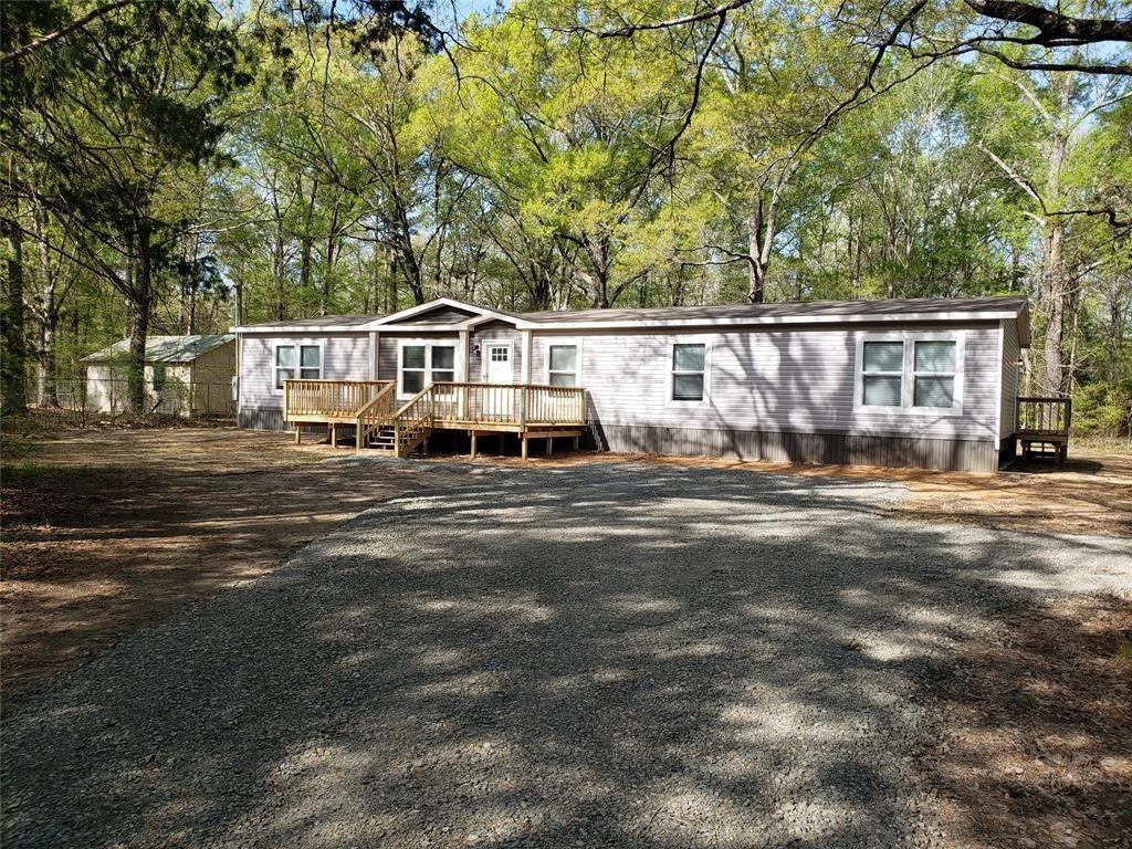 Experience the perfect blend of modern style and rural freedom at 11642 Sparks Davis Road. Built in 2022, this contemporary 4-bedroom, 2-bathroom manufactured home sits on a sprawling 2.272-acre lot, offering the ultimate canvas for your country lifestyle. Inside, the home shines with a sophisticated cool grey color palette and sleek modern flooring that flows through an open-concept living space. With over two acres of private land, you have ample room for a workshop, garden, or simply enjoying the peaceful surroundings. This is a rare opportunity to own a nearly-new, move-in-ready retreat with the space and style you’ve been searching for.