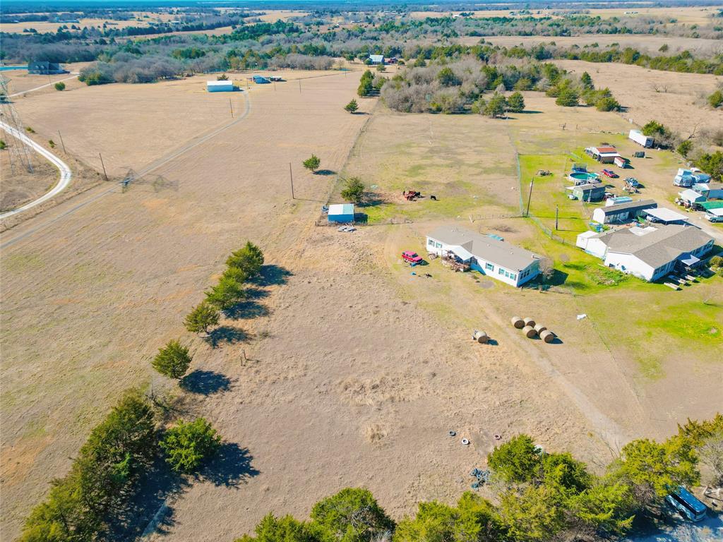 Spacious double wide mobile home situated on 13.020 unrestricted acres. Offering endless possibilities for country living, investment, or future development. The home features 4 bedrooms, 2 bathrooms, and two separate living areas, providing plenty of space for family and entertaining. With no known restrictions the land offers flexibility for livestock, additional homes, or recreational use. Enjoy privacy, open space, and the freedom to make this property your own.