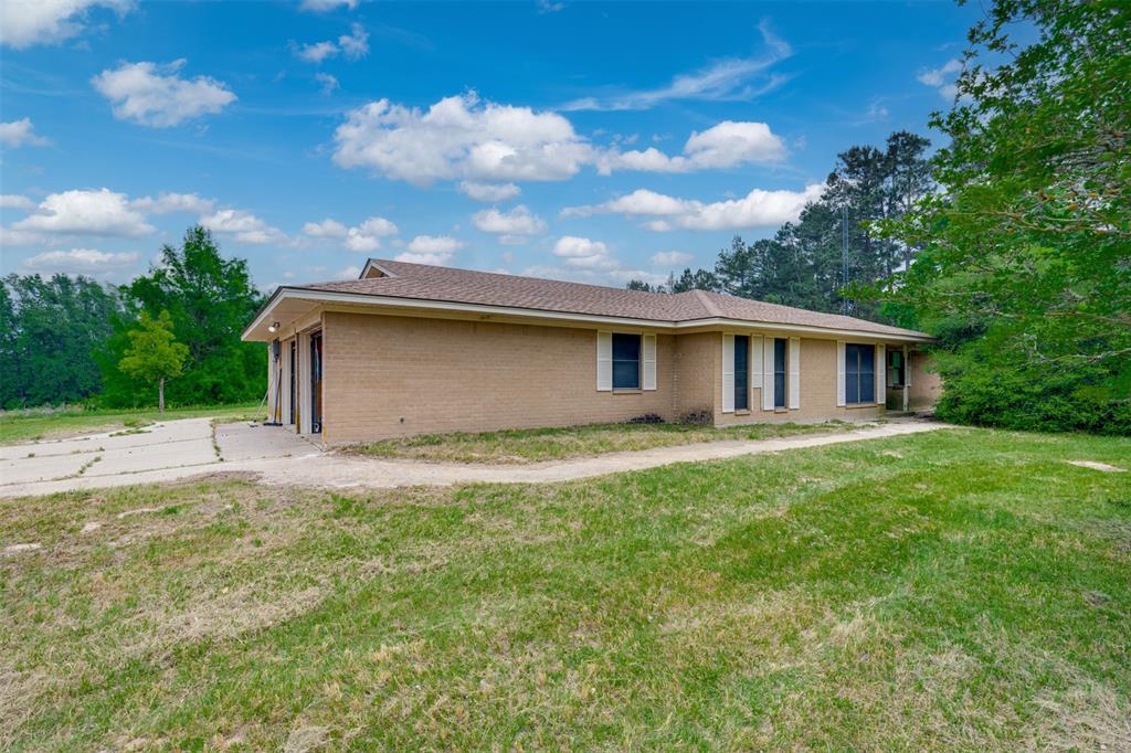 Brick fixer upper built in 1981 situated on 19.5 acres in historic Palestine. Located just outside loop 256 in northern Palestine, this property has a country feel but is located close to everything. An additional .5 acre & manufactured home to be gifted to buyer upon vacancy of family member currently occupying home located at property border, on east side. Acreage consists of pasture with a scattering of mature trees. This 2116 sq. ft. home is in original condition with living & dining area, kitchen & breakfast area, plus a spacious family room with fireplace, 3 bedrooms, and 2 baths. A laundry room and large pantry is located on left when entering from the 2-car garage. The home has a plumbing leak in the slab, so water is not turned on. Accordingly, a limited value has been given to the house. Perfect for someone who is a DIY person or desires to updat-rehab and make an older home into exactly what they want. Storage bldg. (8x10) is located in back yard.