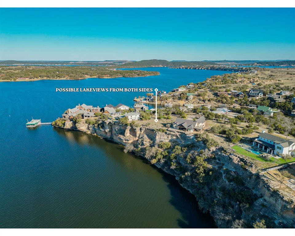 Stunning Cliffside Lot Overlooking Iconic Hells Gate Cove in Gaines Bend on Possum Kingdom Lake. Don’t miss this rare opportunity to own a premium elevated homesite with panoramic views of the legendary Hells Gate Cove and Devils Island. This exceptional location offers breathtaking dual lake views into PK's most popular Lake Cove and views to the cove behind —even from the ground level. Perfectly positioned for your custom dream home, this lot is ideal for an infinity pool, sprawling lakefront patios, and a luxurious estate getaway. Located one of the most premier gated communities at Possum Kingdom Lake, enjoy the perfect blend of privacy and upscale living with minimal building restrictions. Property owners have access to a private boat launch and day slips, with full-time boat SLIPS available for lease at NEARBY MARINA. Build your private lakefront sanctuary in one of Texas’ most sought-after waterfront destinations.Ideal for vacation homes, investment properties, or full-time luxury living.