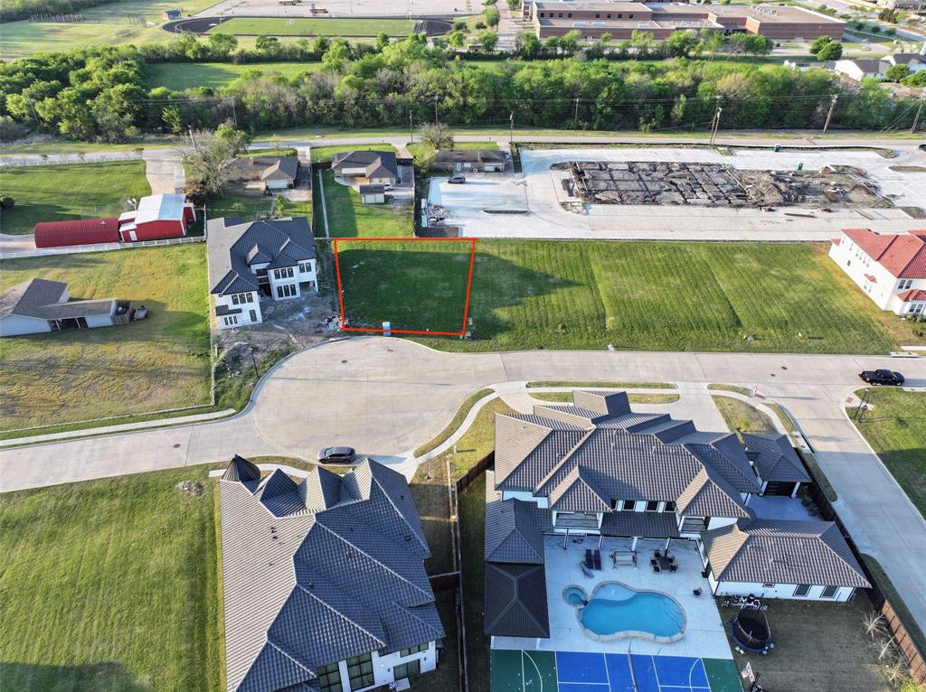 Beautiful residential lot located in a quiet, established neighborhood in Murphy. Positioned on Oshman Dr, approximately one block north of McMillen Rd, this homesite offers a peaceful setting with convenient access to surrounding development and amenities. The lot is surrounded by well-maintained custom homes and new construction, providing strong long-term value and curb appeal. Nearby development and continued growth in the area enhance future investment potential. Ideal for building a custom home in a serene environment while still being close to major roads, shopping, and community conveniences.