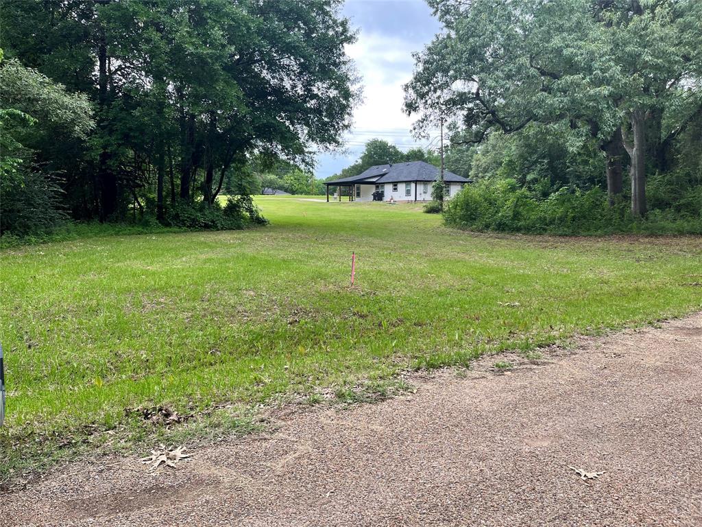 Welcome to your future lakeside haven in the desirable Baywood Estates waterfront subdivision at Cedar Creek Lake. This freshly cleared and surveyed lot is ready for your vision to take shape, offering roughly a quarter of an acre of buildable land with approximately ninety-nine feet of road frontage and one hundred two feet of depth.

A scattering of mature trees adds natural character and welcome shade to this inviting homesite, creating an appealing blend of open space and established landscaping. With a modest six hundred square foot minimum building requirement, you have tremendous flexibility to design anything from a charming lakeside cottage to an expansive custom residence tailored to your lifestyle.

Baywood Estates enhances everyday living with a neighborhood park and boat ramp located just a short walk down the street, putting waterfront recreation within easy reach. Electricity is available for connection at the rear of the lot, and water service is accessible through East Cedar Creek Fresh Water Supply District. A septic system will be required for sewer needs.

Situated on the east side of the lake, this location provides convenient access to Mabank, Gun Barrel City, Athens, and even Dallas. Grocery shopping at Brookshires Food Store and nearby schools are within a comfortable drive, while recreational spots like Madden Playground offer additional family-friendly appeal.

For those wanting extra space, the neighboring lot is available for a combined purchase. Contact us today to explore this wonderful opportunity.