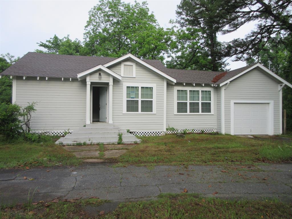 Nicely remodeled home with 2 bedrooms and 2 full baths. Large living room and nice size kitchen. New flooring throughout. New kitchen appliances. New hot water heater. Has a room for an office or could be used as a 3rd bedroom. 1 car attached garage. Large lot. AGENTS: see agent remarks.