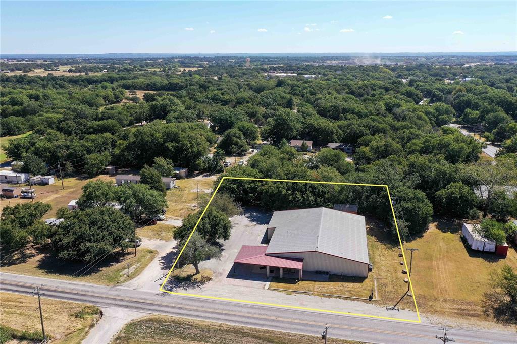 Investment property located in Chico, Texas. Ideal for use by a church with no concern over zoning change. With 6 separate rooms plus large storage rooms and a massive 55ftX60ft great room along with bathrooms with multiple toilets, this is a unique property. Being zoned as residential, this property has potential to go through the process of getting the zoning changed to commercial to open up opportunities for use such as an event center or daycare. If zoning is changed, multiple offices surround the huge open area or sanctuary, including an area that could be set up for an owner or manager apartment. The large kitchen would be perfect for catering events within the building or to use for outside catering or food processing. A retirement facility with common dining and kitchen would work well with minor adaptations and additions of bathrooms. The property has been used as a venue and as a church in the past. Buyer to verify use changes with the city of Chico. Call today.